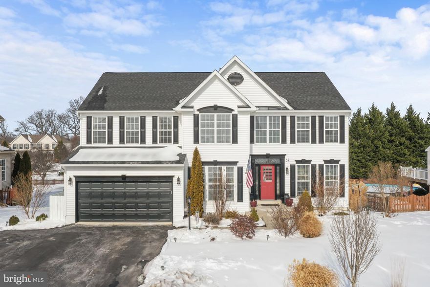 Welcome home to 57 Glory Ridge Place, a beautifully updated 5-bedroom, 3.5-bath home offering space, style, and exceptional outdoor living in a desirable Kearneysville location. Situated on approximately .36 +/- acres, this property features a fully fenced backyard, an extra-wide driveway, and a brand-new 10x10 shed for added storage.

Step inside to find fresh paint throughout and brand-new flooring, creating a modern and cohesive feel. The main level is thoughtfully designed with multiple living spaces, including a spacious family room, a formal living room, and a dining room—perfect for both everyday living and entertaining. The bright breakfast nook flows into the well-appointed kitchen featuring a gas stove and an updated backsplash. A private home office with built-in shelving adds functionality, along with a convenient half bath on this level.

Enjoy seamless indoor-outdoor living from the main level with a 14x31 Trex deck overlooking the backyard, offering ample space for grilling, dining, and relaxing. Beneath the deck is a 16x31 concrete patio, ideal for additional outdoor seating or recreation.

Upstairs, the expansive primary suite is a true retreat, complete with a soaking tub, large walk-in shower, dual separate vanities, and an oversized walk-in closet. Three additional generously sized bedrooms and a full hall bath with double vanity complete the upper level.

The finished walk-out basement provides even more living space with a large recreation room featuring a wet bar, a fifth bedroom, and a full bath—perfect for guests, in-law accommodations, or a private entertainment area.

Additional highlights include new lighting fixtures throughout, new blinds, a two-car garage, and a well-maintained exterior. This move-in-ready home offers comfort, style, and versatility—schedule your showing today!