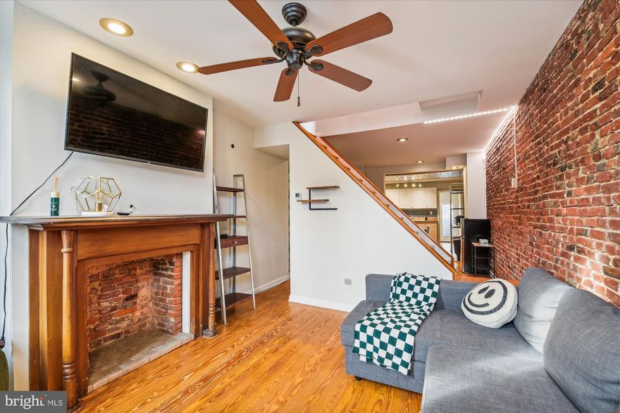 Enchanting Historic Federal Hill Retreat:
This two-bedroom, two-bathroom house is located in the Federal Hill Historic District and features exposed brick. The home offers approximately 950 square feet of living space.

The main living area features hardwood floors and an open layout, providing a spacious and inviting atmosphere. The primary bedroom includes ample closet space, while the second bedroom could serve as a comfortable guest room or home office. Both bathrooms are well-appointed, with modern fixtures and finishes.

The property's historic charm is highlighted by the exposed brick walls, which add character and warmth to the interior. The Federal Hill neighborhood is known for its rich architectural heritage and vibrant community, offering residents access to a variety of shops, restaurants, and cultural attractions.

This home presents an opportunity to experience the unique blend of historic charm and modern amenities that the Federal Hill area is renowned for.

This home Home is priced to sell, ready to be moved in and is being sold strictly AS-IS, seller will not make any repairs and all home inspections are for informational purposes only!