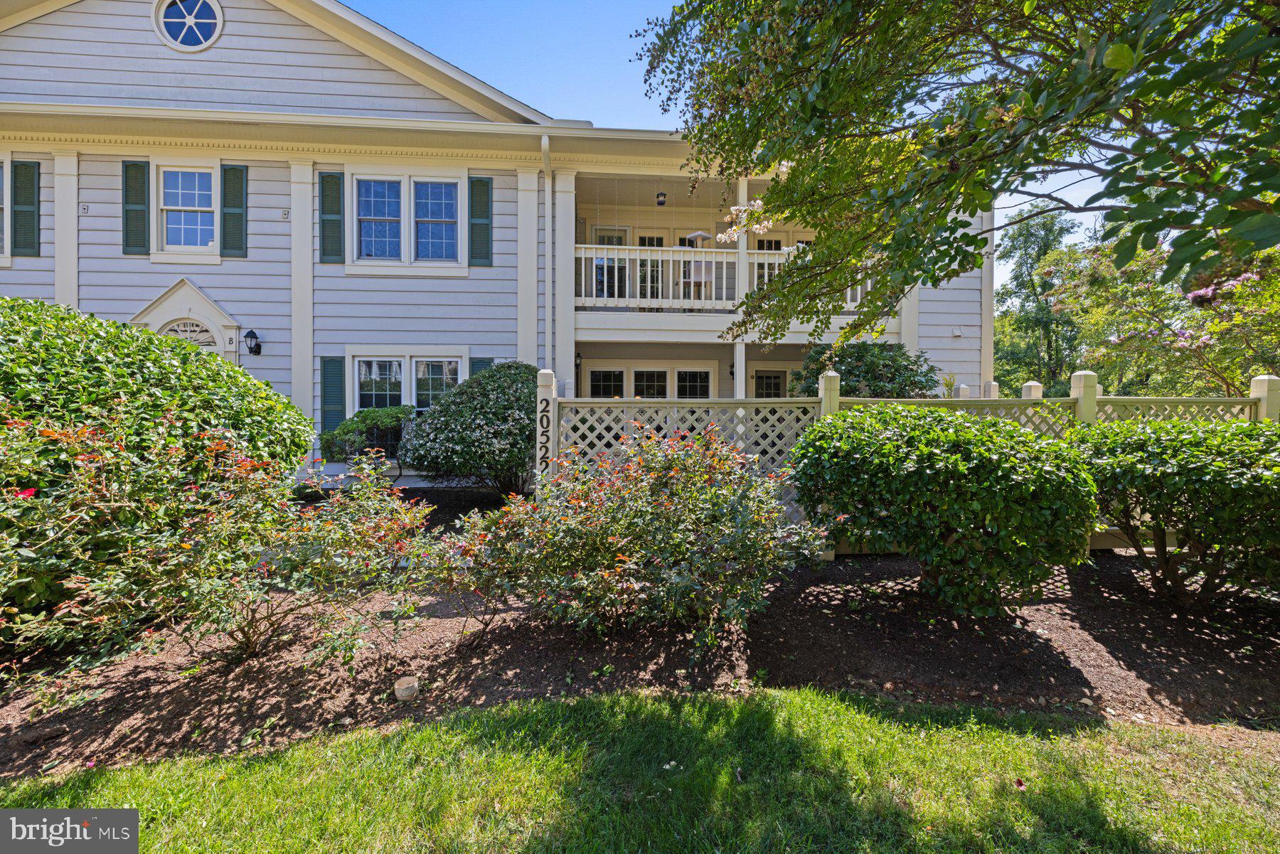 Come see this inviting 2-bedroom, 2-bathroom condo located in the desirable Waters House neighborhood. This convenient ground-level end unit has a large, fenced slate patio that greets you as you approach the front door. Inside, the home boasts beautiful bamboo floors (2018) throughout the main living area. The living room is spacious and open, featuring large windows (replaced in 2014), a wood-burning fireplace, and built-in bookshelves. The open-concept dining room with brick accent wall flows into the kitchen. The kitchen features ceramic tile flooring (2018) and stainless steel appliances. At the end of the kitchen you'll find the handy laundry and utility room. The large primary suite features a walk-in closet, and access to the patio. The primary bedroom even has a western-facing window since this is an end-unit! The en-suite bathroom was completely renovated in March 2023, and has a walk-in shower. The unit's second bedroom is sizable and has its own walk-in closet as well! The full hall bathroom was upgraded in March 2023 and offers a tub/shower. This unit is nestled in a quiet, beautiful courtyard of the amenity-rich Waters House community, which offers walking trails, two pools, a clubhouse, and more. The community is conveniently located for commuters just 1/4 mile from I-270. Don’t miss out on this great opportunity—schedule a showing today!