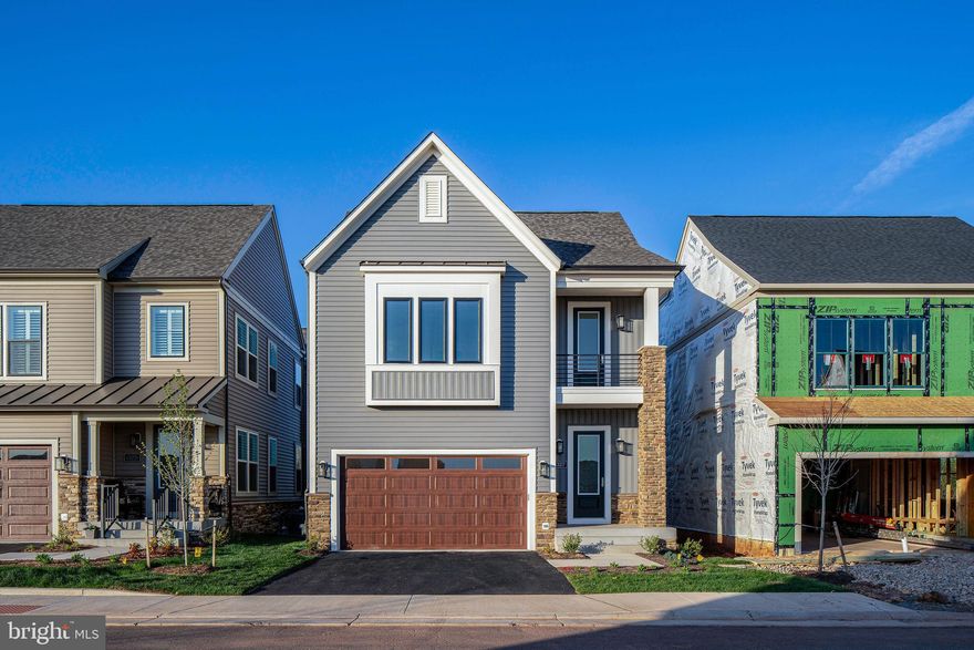 Brand New Miller & Smith Delano in Birchwood at Brambleton, Ready to Move In! Luxury awaits at Birchwood at Brambleton! Discover a new 55+ elevator single-family home by Miller & Smith, boasting 4350 sq. ft. of thoughtfully designed space. With 4 bedrooms and 3.5 baths, including a luxurious primary suite, there's ample space for relaxation and rejuvenation. Hosting gatherings will be a delight in your gourmet kitchen, boasting modern appliances, sleek finishes, and ample counter space for culinary creations. Entertain effortlessly in the spacious living areas, adorned with 10-foot ceilings that add an extra touch of grandeur to every occasion. Escape to the light-filled loft, ideal for a cozy reading nook or a versatile home office. Downstairs, the expansive finished basement provides endless possibilities for recreation, hobbies, or additional living space tailored to your lifestyle. Embrace outdoor living at its finest with a screened porch and deck, perfect for enjoying morning coffee or evening sunsets amidst the beauty of nature. Don't miss your chance to experience the pinnacle of luxury living. Prime location within Birchwood at Brambleton, offering resort-style amenities and a vibrant community atmosphere. Schedule your tour today and envision yourself calling this spectacular residence home. Interior photos represent the model home. Price is subject to change. The sales office is open daily from 11 am to 6 pm. Reach out now to secure your slice of paradise in Birchwood at Brambleton!