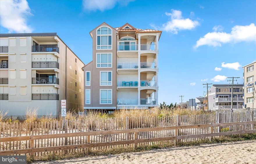 Welcome to luxury oceanfront living at its finest in this exquisite 3-bedroom, 2.5-bathroom condo nestled within a prestigious boutique building in Ocean City, MD. Step into a world where every detail has been meticulously crafted to offer unparalleled comfort and style. Upon entering, you are greeted by breathtaking panoramic views of the Atlantic Ocean. The kitchen, adorned with upscale GE Monogram Appliances, granite countertops, a breakfast bar and custom cabinets, seamlessly flows into the family room and dining area. A cozy fireplace enhances the ambiance, creating the perfect setting for entertaining guests or relaxing. The oceanfront primary bedroom boasts a luxurious en-suite bath featuring a soaking tub and a tiled shower, providing a serene retreat. Two additional large bedrooms provide ample space for family and guests, ensuring everyone feels at home. Imagine waking up to the soothing sounds of the ocean waves and enjoying spectacular sunrise views from the comfort of your own home. The location is ideal, with proximity to shopping, restaurants, and the charming Fenwick Island. For added convenience and peace of mind, the condo features electronic storm shutters, a secure lobby with elevator access directly to your unit, a storage closet, and two dedicated parking spaces. The HVAC and water heater are recently updated, ensuring efficiency and reliability, ( HVAC replacement 2019, water heater 2022).  New luxury vinyl plank flooring and custom tile throughout add a touch of modern elegance. To top it all off, indulge in the ultimate luxury experience on the rooftop lounging area, perfect for watching fireworks or enjoying evening gatherings with friends against the backdrop of the ocean. Don't miss your opportunity to own this exceptional oceanfront oasis where luxury meets coastal living. Schedule your private tour today and immerse yourself in the beauty and tranquility of Ocean City's finest condominium living.