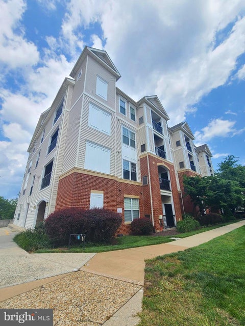 Photo of 11326 Aristotle Drive #4-303, FAIRFAX, VA 22030 (MLS # VAFX2332826)