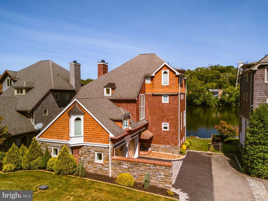 Nestled in the heart of one of Gladwyne's most sought-after locations, this exquisite riverfront property offers unparalleled luxury and privacy. Spanning across 3,880 square feet , this home boasts 4 spacious bedrooms + Den and 5 elegantly designed bathrooms, perfect for family living and entertaining guests.
Picturesque views on the Schuylkill River, discover the charm and elegance of this meticulously designed home nestled along the scenic River Road in the prestigious community of Gladwyne, Pennsylvania. Key Features:  Bedrooms: 4 spacious bedrooms, each designed with comfort and privacy in mind. The master suite offers a serene retreat with ample natural light, walk-in closets, and a spa-like en suite bathroom. Bathrooms: 4 full bathrooms and 2 half baths, each adorned with high-end fixtures and finishes. The master bath features a soaking tub, walk-in shower, and dual vanities, providing a perfect space for relaxation  Living Spaces: The open-concept living and dining areas create an ideal flow for entertaining and daily living. The grand living room with large windows captures stunning views of the surrounding landscape, and the adjacent dining room is perfect for hosting gatherings.  Kitchen: The gourmet kitchen is a chef’s dream, complete with custom cabinetry, top-of-the-line stainless steel appliances, an oversized island with seating, and ample storage space. A breakfast nook provides a cozy spot for casual meals while enjoying garden views. Outdoor Spaces: Step outside onto the beautiful deck or patio, where you can enjoy peaceful views of the rolling landscape and nearby river. The outdoor space is perfect for dining al fresco or simply relaxing in the serene environment. Additional Features: This home includes a spacious family room, a home office or study, and a finished basement that offers endless possibilities for a home gym, media room, or additional living space. Parking: A large driveway and attached garage provide ample parking and storage options. Located in the highly desirable Gladwyne area, this home offers the perfect blend of tranquility and accessibility, just minutes from top-rated schools, upscale shopping, fine dining, and recreational activities. Experience luxury living with all the comforts of a modern home at 236 River Rd.