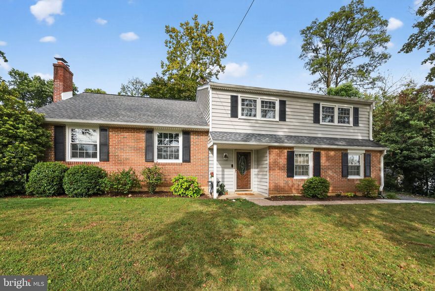 Welcome to 202 Fairfield Drive – A Beautiful Split level in a Sought-After Neighborhood. Nestled in a serene and family-friendly community within the award-winning Wallingford-Swarthmore School District, this spacious 4-bedroom, 2.5-bathroom home offers comfort, charm, and room to grow. Step through the elegant leaded glass front door into a welcoming foyer with a convenient coat closet. To your left, the inviting formal living room features a wood-burning fireplace and classic dentil molding mantel—perfect for cozy evenings or entertaining guests. The living room flows seamlessly into the formal dining room  which leads to a bright eat-in kitchen. The kitchen is outfitted with cherry appliances, tile countertops, and a matching tile backsplash—both stylish and functional. Just off the kitchen down the stairs is a stunning, sun-drenched family room. With a wall of windows, and built in book shelves surrounding the wood burning fireplace, this expansive space is ideal for gathering, relaxing, or simply enjoying the natural light. A spacious two-car garage offers ample storage and direct access to the foyer. A convenient powder room and laundry room complete with washer, dryer, completes the first floor. Upstairs, you'll find two generously sized bedrooms and a full hall bath, along with a spacious primary suite that includes two walk in closets and a private ensuite updated bathroom . A fourth bedroom, located on the opposite side of the house, features additional storage and versatile space—perfect for a home office, guest room, or playroom. The large finished basement provides excellent room for enjoying movie night and offers plenty of space for a home office, game room and plenty of storage. Lastly, enjoy those warm summer evenings on a spacious composite deck with steps down to a paver patio.  Don’t miss the opportunity to make this warm and welcoming home your own in one of the area's most desirable neighborhoods.