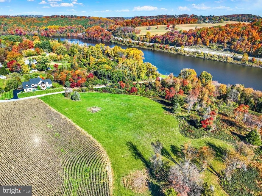 WHAT AN OPPORTUNITY!!! Here is a sweet, level, large 5.5 acre parcel of land on a very private street and listen to this! You can walk about 2 minutes to the water of Lake Redman's boat launch. Like biking? Walk out the door grab the bike and take a 15 mile ride on the groomed trails of York Water Co. all along the lake.  How about riding horses? They are welcome here. This land has so many possibilities being adjacent to acres and acres of William H. Kain County Park  is secluded, sits high overlooking the lake at the rear, yet only minutes to I-83 for the commuters. Breathtaking views all around.   Zoned ag so you might want to create your own homestead and live on the land and stay in your haven. Golden opportunity to build on possibly the nicest piece of land anywhere. Located in Dallastown Schools . Drive to Main St and it's only minutes to Apple Hill and the hospital. Look at the pictures and you'll fall in love. Oversized parcels like this are rare rare rare! Call for an appointment. For GPS users, the neighbor across the street address is 5624 York Rd.