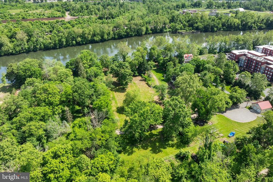 Escape the ordinary and embrace the extraordinary with this waterfront lot!   Whether you're seeking a secluded sanctuary to call home or an investment opportunity with unlimited potential, this 3.36 acre parcel offers the perfect canvas to turn your dreams into reality and offers a rare opportunity to craft your own waterfront oasis!