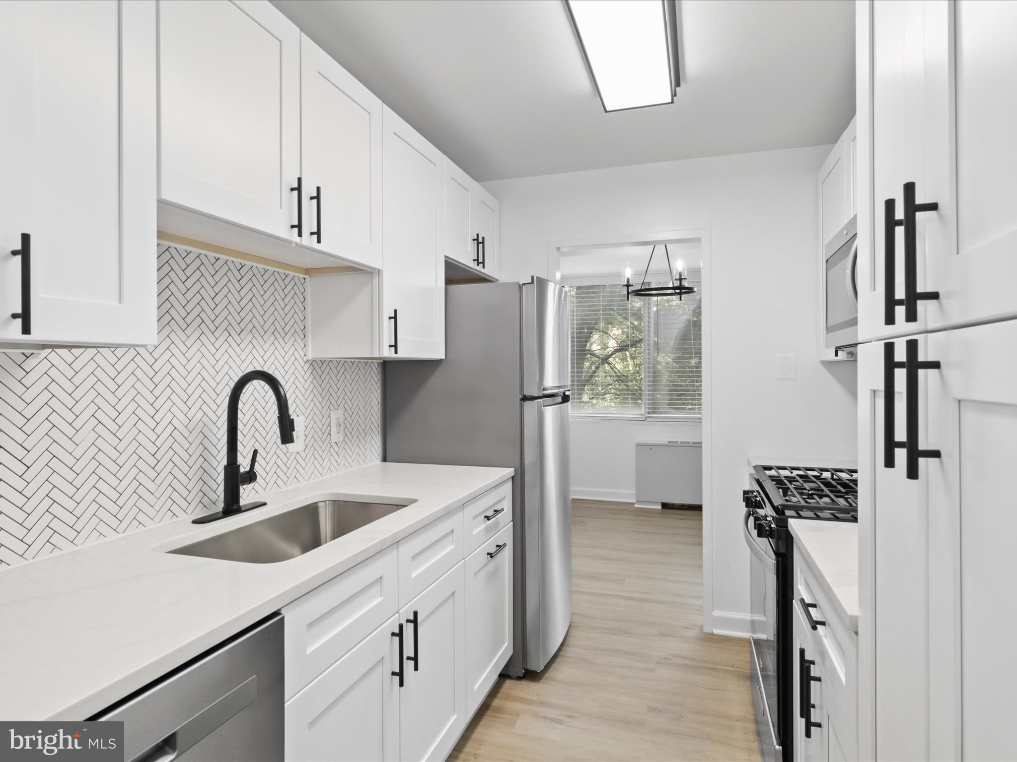 Welcome to this beautifully renovated 2-level condo offering the perfect blend of style, comfort, and convenience. This move-in ready residence features a brand-new gourmet kitchen with sleek cabinetry, quartz countertops, and stainless steel appliances—perfect for home chefs and entertainers alike. The newly updated bathrooms showcase contemporary finishes, custom tile work, and spa-inspired fixtures, bringing a luxurious touch to your everyday routine. Enjoy fresh new flooring and designer paint throughout, creating a bright and inviting atmosphere. This condo also comes with garage parking and additional storage space—a rare find in such a prime location. Located in one of Alexandria City's most desirable communities, you'll enjoy exceptional amenities including a 24-hour front desk, fitness center, pool, and more. ALL UTILITES INCLUDED except Internet/Cable!! All of this just minutes from Old Town Alexandria, shopping, dining, Metro, and major commuter routes (super close to bus to Pentagon). Be the first to enjoy this fully renovated unit. Don't miss your chance to live in a truly turnkey home in an unbeatable location!