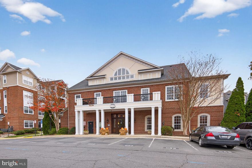 Welcome to 12905 Centre Park Circle, a lovely 1-bedroom condo with covered garage parking in Herndon’s sought-after Bryson at Woodland Park community. Classic hardwood floors flow throughout the living areas and bedroom, while nine-foot ceilings and an open floor plan give the home a spacious feel. The updated kitchen features ceramic tile flooring, 42-inch cabinets with brushed-nickel hardware, stainless-steel appliances, sleek granite countertops, and a useful island illuminated by chic pendant lights with an overhang for bar-stool seating. Elegant crown molding and track lighting add a touch of sophistication to the living room, and the cozy fireplace is perfect for winter evenings. Step out the sliding glass door to your private patio overlooking the serene courtyard—an ideal spot for morning coffee. The roomy owner’s suite offers a large walk-in closet with built-in shelving for added organization, and the en-suite bath includes a deep soaking tub, ample counter space, and a linen closet for towels and accessories. Additional conveniences include an in-unit washer and dryer and two covered garage parking spaces. Bryson at Woodland Park provides luxury amenities such as gated entry, a clubhouse, concierge services, a fitness center, billiards room, business center, and two outdoor pools. Conveniently located minutes from the Herndon Metro with quick access to the Dulles Toll Road, Fairfax County Parkway, Route 28, and Dulles International Airport. You’re also steps from a vibrant shopping center with Harris Teeter, Starbucks, and great dining options, and just 0.3 miles from Reston Town Center—this place truly has it all!