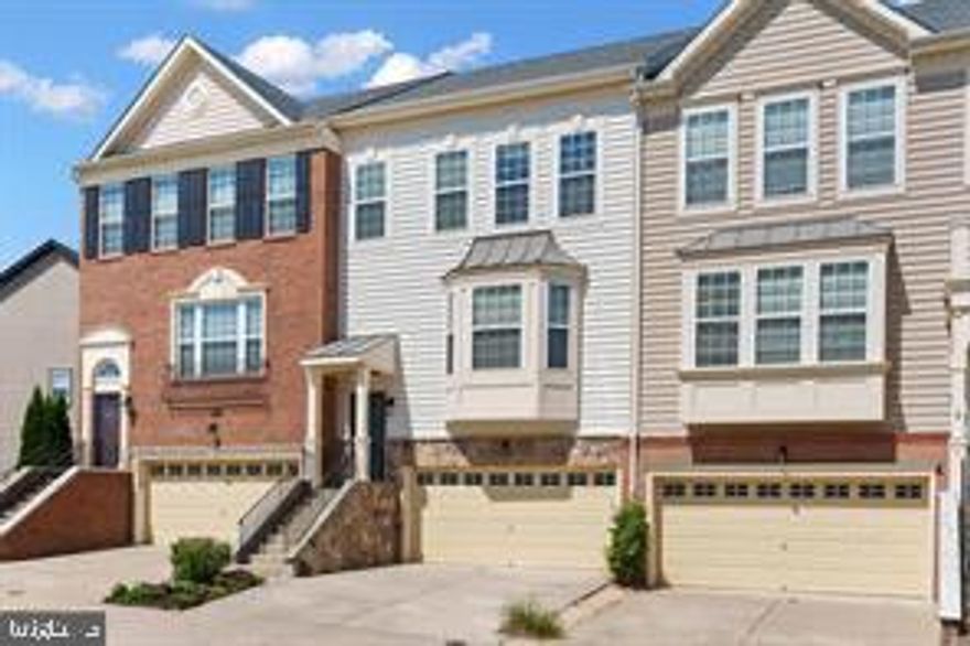 Perfect location This contemporary townhome is located less than 3  minutes from I95, all shopping needs, and more!Beautiful open kitchen design with a huge island with quartz top and stainless appliances. Barely lived in, this stunning home boasts 3 bedrooms, two and two half bathrooms, and a spacious two-car garage. Gorgeous open layout with an abundance of natural light flowing in from large windows, enhanced with recessed lighting. Upgrades galore including bright upgraded cabinets,