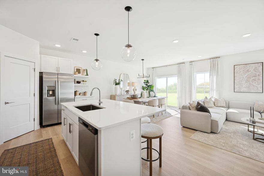 ESTIMATED OCTOBER/NOVEMBER MOVE-IN! Discover our Sweet Pea floorplan, blending modern comfort and thoughtful design in this stunning brand-new home with a partially finished basement and full bath! With 2,770 sq ft of living space, this 4-bedroom, 4 full bath home with an open-concept layout and 9’ ceilings throughout the main level is waiting to welcome you home. The upgraded kitchen is a true centerpiece, showcasing quartz countertops, a large island, and a walk-in pantry, perfect for everyday living and entertaining alike. The spacious great room offers an inviting space for gatherings or cozy nights at home. Retreat to the primary suite, complete with an oversized walk-in closet and a spa-inspired bath featuring double vanities and a semi-frameless walk-in shower. An Extra Suite on the main level provides exceptional flexibility—ideal for guests, multigenerational living, or a private home office. This home also features our designer curated Farmhouse Look which includes 42” staggered upper cabinets and floating shelves, adding a sense of charm and providing a unique space to display your favorite decor or dinnerware. A Farmhouse white apron front sink completes the modern Farmhouse Look along with sleek seamless Quartz kitchen countertops and stainless-steel appliances. Vintage inspired lighting, rustic main level flooring, and farmhouse finishes complete the Farmhouse charm throughout the home. This home offers the perfect balance of luxury, function, and comfort. Huntwell West is a highly sought after community conveniently located within minutes from shopping, dining, and outdoor adventures. Explore nearby gems like Historic Harpers Ferry, Historic Shepherdstown and Downtown Charles Town, just minutes from Hollywood Casino at Charles Town Races. Enjoy close proximity to commuter routes to Washington, D.C., Frederick, MD, and Northern Virginia. Call today to schedule your private tour! Ask about our closing costs assistance with K Hovnanian American Mortgage. **Photos may be of a decorated Model Home/similar home and features and may not reflect current home finishes. Pricing, options, and promotions are subject to change without notice. **