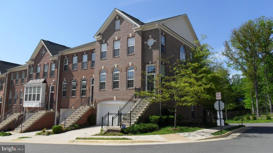 * Back on the market due too financing. This beautiful brick all around end unit townhome has 3 bedrooms and 3 ½ bathrooms. With over 2400 finished square feet of space. 

The upgraded kitchen has new granite countertops, Maple cabinets, brand new professionally installed stainless steal dishwasher, stainless steel appliances & gas cooktop. The back of the kitchen has a bank of windows that lets the light in and French doors that walk out to the large deck. To the side of the kitchen is a family area with a fireplace. 

The front of the home has a large living room with a bank of Palladian windows. The formal dining room entrance is marked with columns and adorned with crown molding, chair railing and wainscoting.  

The huge main bedroom has a tray ceiling, large walk-in closet and a Luxury bathroom with separate soaking tub and shower. The two additional bedrooms have vaulted ceilings. 

It has a 2 car finished garage with a 2 car driveway. 

Your home association membership gives you access to the Lorton Valley community center pool, club house as well as many other amenities.