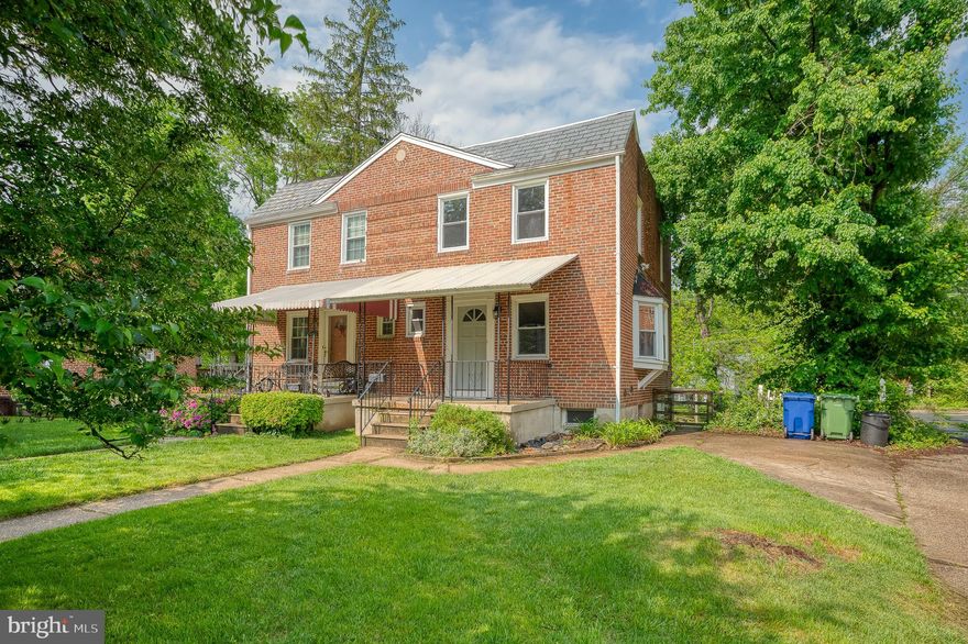 Don't miss this brick semi-detached porch front home in the heart of Mt. Washington!  Features include: a kitchen with granite counters and an island open to the dining area,  hardwood flooring in living room, dining area, and bedrooms. The main level has a half bath.  The  lower level walks out to patio area and large yard. There is a parking pad in front. New Roof in 2022.  Excellent Location! Open Saturday 11-12.  Reach out for your appointment today.