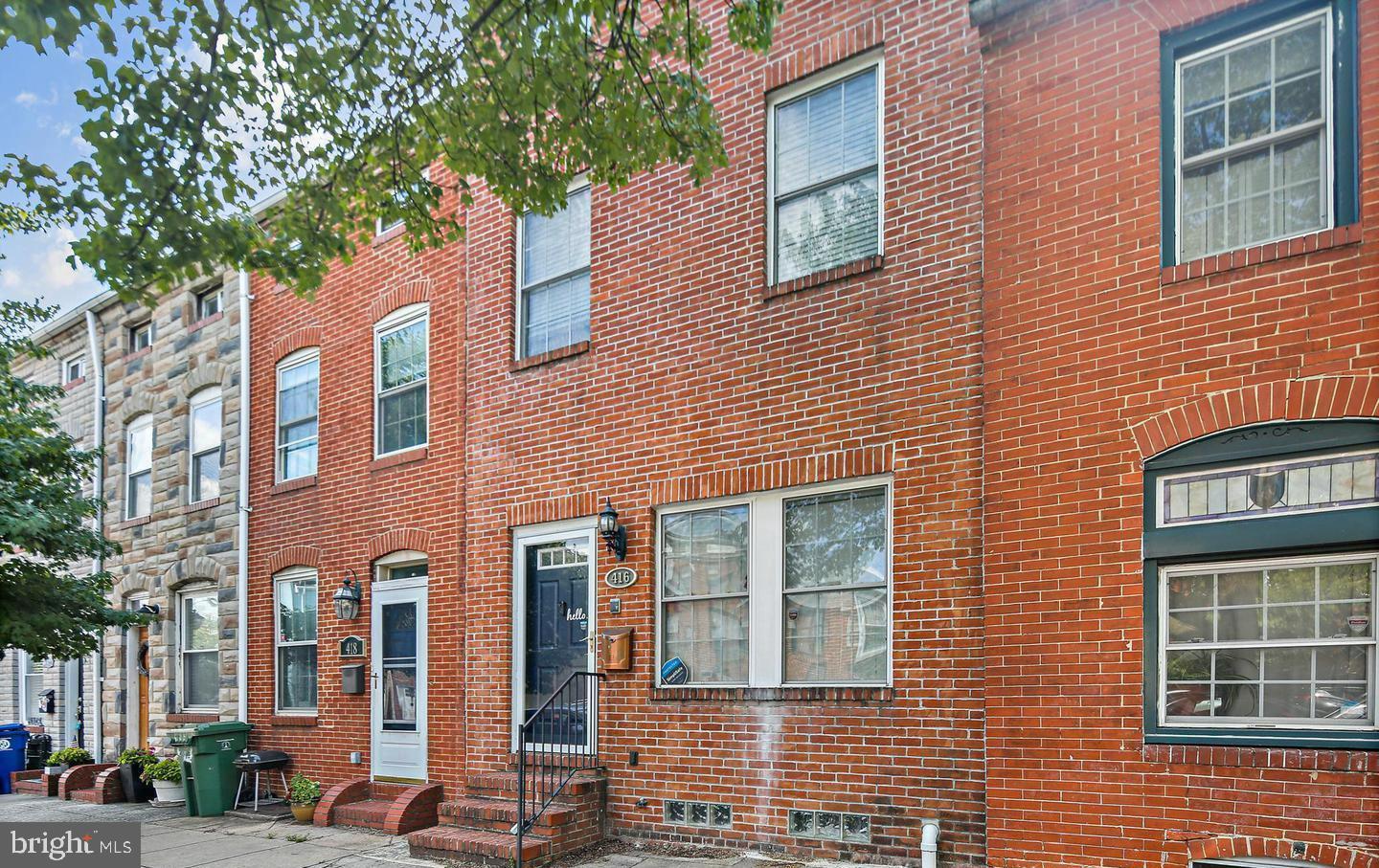 Welcome to 416 S Washington Street — a beautifully updated brick rowhome with 4 bedrooms, 2 full baths and 2 half baths, this home blends historic charm with modern convenience.
Inside, you’ll find gleaming hardwood floors, an open-concept main level flooded with natural light, and a modern kitchen to inspire your inner chef. The kitchen features granite countertops, maple cabinets, and sleek stainless-steel appliances, and continues to the living room with opening to an oversized brick courtyard, perfect for entertaining. The flow of the home is seamless, with light-filled bedrooms on the second and third floors — including a luxurious primary suite that feels like your own urban retreat.
Head up to the private rooftop deck, where you can toast the skyline and water views — the perfect setting for morning coffee or evening wine. Out back, a large private patio offers even more outdoor space to relax, host, or garden.
Location? Unmatched. Nestled between Johns Hopkins, Harbor East, Patterson Park, and Fells Point, everything you love about the city is at your doorstep — parks, restaurants, cafes, and waterfront charm. All the beauty and soul of Baltimore — in walking distance. The list goes on and on!