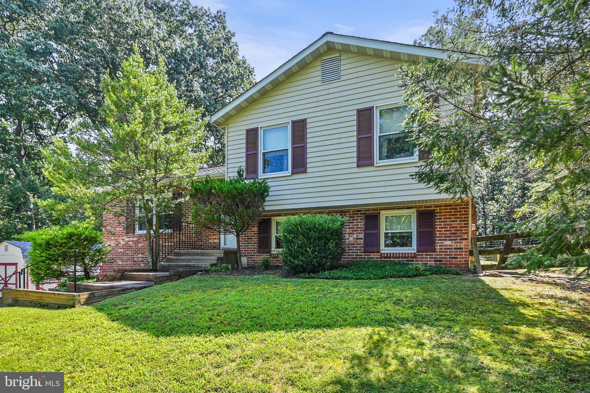 Open House*** Fri, Aug 22 5:00 PM - 6:00 PM**Welcome to this charming 3-bedroom, 1.5-bath split-level home, offering over 2,000 sq. ft. of living space in a peaceful, quiet neighborhood. This home features a spacious and inviting living room with natural flooring and a cozy wood-burning stove in the Sun Room, perfect for those colder nights. The updated kitchen boasts stunning granite countertops, stainless steel appliances, and ample cabinet space, ideal for preparing meals and entertaining guests. This Lovely Sun Room that Leads to a Nice Deck Overlooking a Beautiful Fully Fenced Rear Yard that has been Meticulously Maintained with pool ready for swimmers! Newer Roof On the House, new shed 2025!