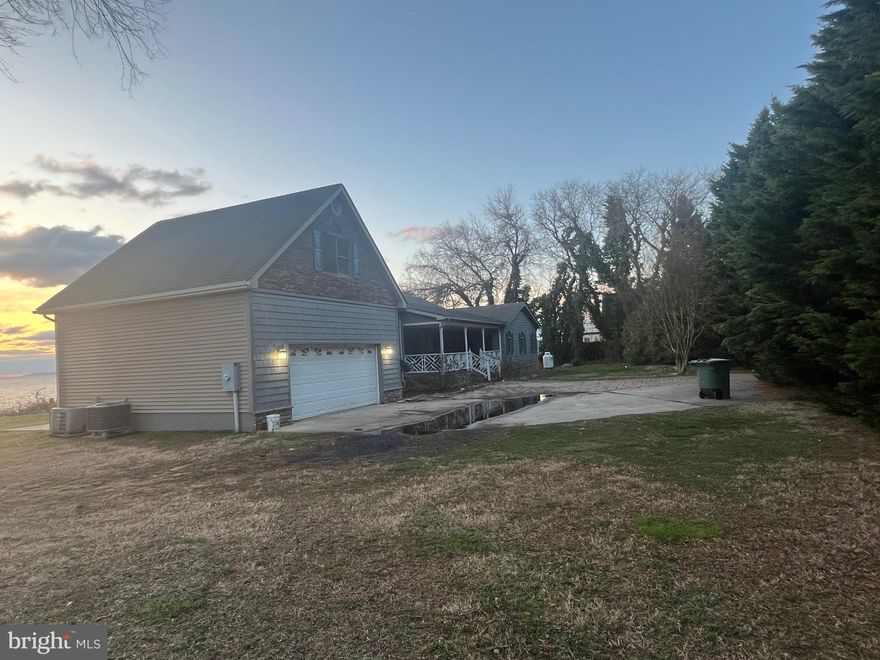 Home Being Sold AS IS! Coming Soon! Don't miss this beautiful waterfront property on 2 lots. This property is waiting on you to come give it your personal touch.  Enjoy relaxing on the beautiful composite deck or fishing or crabbing off your private dock.  An outdoor shower to wash off before entering the home. Hidden behind evergreens you have a very private area. This home has a double sided fireplace, concrete driveway, and a room upstairs that has a deck off the room. New back slider doors installed in Feb 2025. There is a nice shed on the property for storage. There is a large room above the garage.  This is located in a community that has a voluntary HOA . There is a private beach and boat ramp and slips to use with the HOA dues.