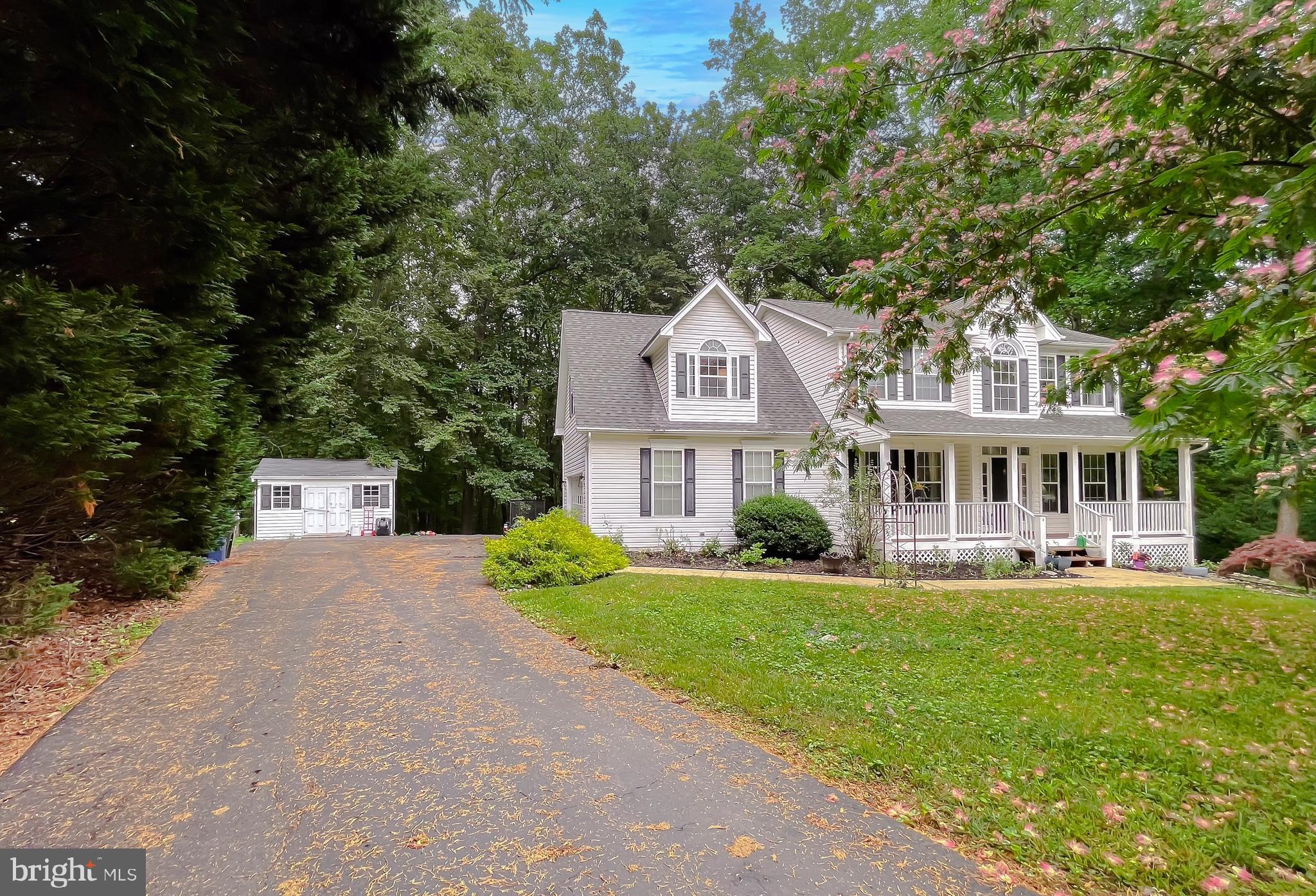 This home sits on almost an acre (.97) of land where buyers will enjoy not only the sounds of nature, but of a peaceful retreat where privacy abounds. This home does NOT have an HOA, if you'd like chickens, bring them, you'll enjoy fresh eggs each morning!
This spacious Colonial is located in the Huntingtown High School District and offers four full bedrooms and three and one half baths. Upon entering, you'll find a lovely front porch, the perfect spot to enjoy your morning coffee while watching the morning activities. Greet guests in your two story foyer with hardwood floors, there's a spacious kitchen with granite counters, a center island, built in microwave and doors leading to the deck with the adjacent family room, dining room and den, this floor plan has been perfectly designed for entertaining your guests. Upstairs you will find three spacious bedrooms. The oversized owner's suite offers a HUGE walk in closet and an amazing full bath with a jetted tub, the perfect place to unwind after a long days work, there's a separate shower and double sinks giving you plenty of space. There are two additional good sized bedrooms with full bath. Downstairs you'll find another bedroom with full bath. The sports enthusiast will be super excited over the spacious recreation room, the perfect spot for watching your favorite football team. There's also plenty of room for your crafts. Located in beautiful Calvert County, you'll find many parks, beaches, boating, fishing and crabbing nearby. There's a state of the art library, hospital, shops, restaurants, wineries, horseback riding and more! Located 37 miles from Joint Base Andrews, 44 miles to the Navy Yard, 46 miles to PAX River Naval Base, 38 miles to Annapolis. Easy commute to I-495, Route 50, Route 2 and more.