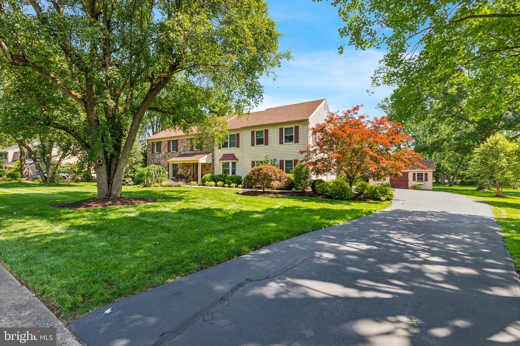 Welcome to 1015 Pheasant Meadow, a beautifully upgraded and impeccably maintained 5 bedroom, 3 full bathroom, 2 half bathroom home nestled on just over an acre of land, an oasis of privacy and serenity tucked within a quiet neighborhood that feels worlds away. Originally a 6 bedroom layout, 2 were combined to create a luxurious in-law style suite, making this home ideal for all lifestyles and needs with thoughtful spaces and comfort for every chapter.
As you enter through the front door, you're greeted by a striking 2-story foyer that opens to a home filled with warmth, light, and refined finishes. To the right, the formal dining room features a charming bay window, while to the left, the living room offers custom built-ins, elegant crown molding, and newly recarpeted floors. Just beyond, the family room includes a second bay window, recessed lighting, elegant crown molding, and a beautiful wood-burning stone fireplace with built-in bookcases. The family room also provides direct access to the professionally landscaped backyard, a private haven featuring finished entertaining space, hardscaping, and a dedicated electric setup.
Flowing seamlessly from the family room is the bright and inviting entertaining kitchen space, complete with a custom-built desk and bar area, a warm, multifunctional hub ideal for hosting and everyday life, which leads into a stunning island kitchen. Remodeled and expanded just 10 years ago, the kitchen features granite countertops, custom wood cabinetry, and top-of-the-line stainless steel appliances, including a Wolf stove with gas cooktop and electric oven, a GE Monogram double wall oven with Advantium speed cook and standard oven, a warming drawer, and a Bosch dishwasher. A hall full of custom pantry cabinetry leads from the kitchen to the laundry area, offering smart storage space. A nearby powder room and renovated laundry room with sink and built-in storage provide convenience, while the spacious 2-car garage has a refinished floor and custom shelving.
The second floor hosts 5 spacious and sun-filled bedrooms. The main primary suite is a true retreat, complete with an oversized walk-in closet, a sitting area with fireplace, and a luxurious ensuite bathroom featuring a steam shower, BainUltra soft water jet massage tub, dual-sink vanity, large linen closet, and custom finishes. 3 additional bedrooms each have oversized closets, and one includes a private ensuite bathroom with stylish vanity, stall shower, and walk-in closet. A spacious fifth bedroom, currently used as an office, completes the level. A full hallway bath includes a dual-sink vanity, a stall shower, and a separate tub and shower combination. Additional features include a cedar closet, a hallway linen closet, and pull-down stairs to a partially floored attic.
The lower level is fully finished and offers exceptional flexibility and entertaining space. It features a full built-in wet bar with sink, a large recreation area with home theater setup and closets along one wall, a home gym, a dedicated storage room with shelving, and a convenient half bath. Flooring includes tile with carpet overlay in certain areas and rubber mat flooring in the gym. There is also outdoor access to the backyard for seamless indoor-outdoor living.
Additional features include all-new hardwood floors, fresh paint throughout, new carpeting in the living room, stairs, and bedrooms, and all-new energy-efficient windows. The siding and roof were replaced about 10 years ago. A 3-season room off the kitchen has been newly recarpeted. The home also features a full home security system, an electric pet fence, a tankless water heater (2025) with an advanced alert system, 2 HVAC zones replaced in the past 10 years, and outdoor electric.
Every detail of 1015 Pheasant Meadow has been carefully considered, from intricate woodwork to premium systems. This move-in-ready home offers exceptional comfort, flexible living, and high-end upgrades throughout.