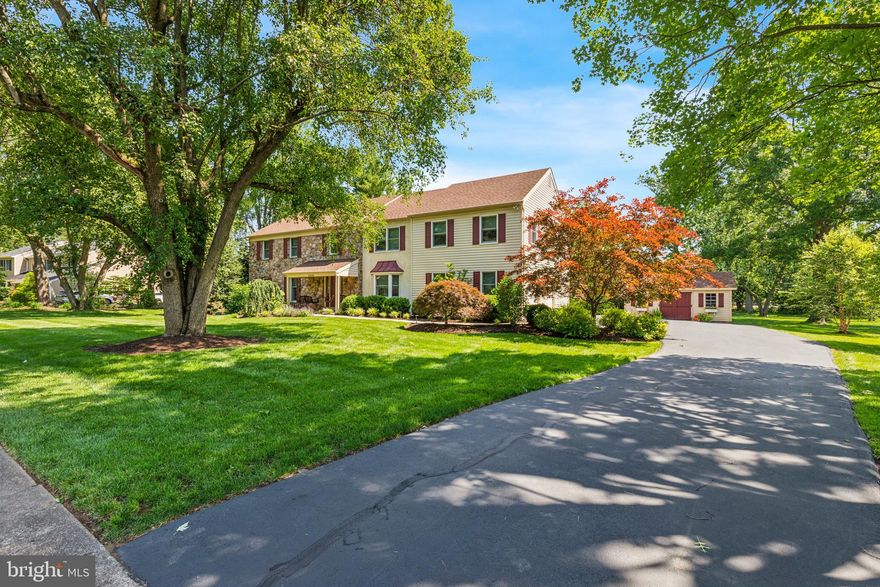 Welcome to 1015 Pheasant Meadow, a beautifully upgraded and impeccably maintained 5 bedroom, 3 full bathroom, 2 half bathroom home nestled on just over an acre of land, an oasis of privacy and serenity tucked within a quiet neighborhood that feels worlds away. Originally a 6 bedroom layout, 2 were combined to create a luxurious in-law style suite, making this home ideal for all lifestyles and needs with thoughtful spaces and comfort for every chapter.

As you enter through the front door, you're greeted by a striking 2-story foyer that opens to a home filled with warmth, light, and refined finishes. To the right, the formal dining room features a charming bay window, while to the left, the living room offers custom built-ins, elegant crown molding, and newly recarpeted floors. Just beyond, the family room includes a second bay window, recessed lighting, elegant crown molding, and a beautiful wood-burning stone fireplace with built-in bookcases. The family room also provides direct access to the professionally landscaped backyard, a private haven featuring finished entertaining space, hardscaping, and a dedicated electric setup.

Flowing seamlessly from the family room is the bright and inviting entertaining kitchen space, complete with a custom-built desk and bar area, a warm, multifunctional hub ideal for hosting and everyday life, which leads into a stunning island kitchen. Remodeled and expanded just 10 years ago, the kitchen features granite countertops, custom wood cabinetry, and top-of-the-line stainless steel appliances, including a Wolf stove with gas cooktop and electric oven, a GE Monogram double wall oven with Advantium speed cook and standard oven, a warming drawer, and a Bosch dishwasher. A hall full of custom pantry cabinetry leads from the kitchen to the laundry area, offering smart storage space. A nearby powder room and renovated laundry room with sink and built-in storage provide convenience, while the spacious 2-car garage has a refinished floor and custom shelving.

The second floor hosts 5 spacious and sun-filled bedrooms. The main primary suite is a true retreat, complete with an oversized walk-in closet, a sitting area with fireplace, and a luxurious ensuite bathroom featuring a steam shower, BainUltra soft water jet massage tub, dual-sink vanity, large linen closet, and custom finishes. 3 additional bedrooms each have oversized closets, and one includes a private ensuite bathroom with stylish vanity, stall shower, and walk-in closet. A spacious fifth bedroom, currently used as an office, completes the level. A full hallway bath includes a dual-sink vanity, a stall shower, and a separate tub and shower combination. Additional features include a cedar closet, a hallway linen closet, and pull-down stairs to a partially floored attic.

The lower level is fully finished and offers exceptional flexibility and entertaining space. It features a full built-in wet bar with sink, a large recreation area with home theater setup and closets along one wall, a home gym, a dedicated storage room with shelving, and a convenient half bath. Flooring includes tile with carpet overlay in certain areas and rubber mat flooring in the gym. There is also outdoor access to the backyard for seamless indoor-outdoor living.

Additional features include all-new hardwood floors, fresh paint throughout, new carpeting in the living room, stairs, and bedrooms, and all-new energy-efficient windows. The siding and roof were replaced about 10 years ago. A 3-season room off the kitchen has been newly recarpeted. The home also features a full home security system, an electric pet fence, a tankless water heater (2025) with an advanced alert system, 2 HVAC zones replaced in the past 10 years, and outdoor electric.

Every detail of 1015 Pheasant Meadow has been carefully considered, from intricate woodwork to premium systems. This move-in-ready home offers exceptional comfort, flexible living, and high-end upgrades throughout.