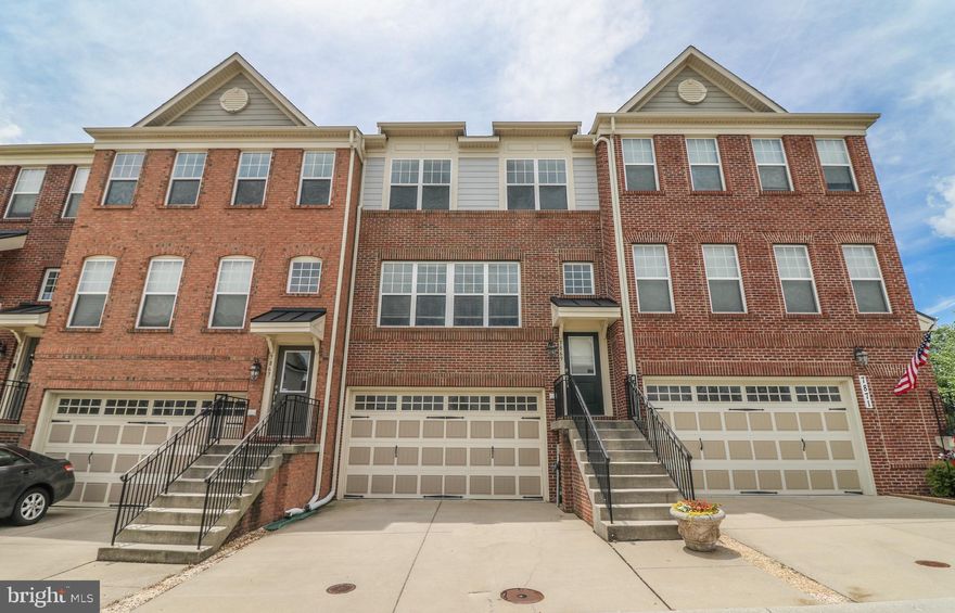 Live in luxury in this beautiful townhome with tasteful upgrades. This 3 bedroom, 2.5 bath unit at The Enclave at Arundel Preserve is spacious and light filled. Both upper levels boast gleaming hardwood floors and large windows throughout. The open floor plan includes a large dining room and living room along with an eat-in kitchen with stainless appliances, granite counter-tops, custom back-splash, and breakfast bar. A large deck, great for entertaining, is accessible from the kitchen. On the lower level, you'll find a spacious and elegant space great for relaxing or entertaining. The home is minutes away from the region's largest shopping center (Arundel Mills), MD295, I95, BWI Airport, MARC train, Fort Meade and NSA. Walking distance to fine dining and entertainment. The most discerning buyers will be delighted and the property will not last long!