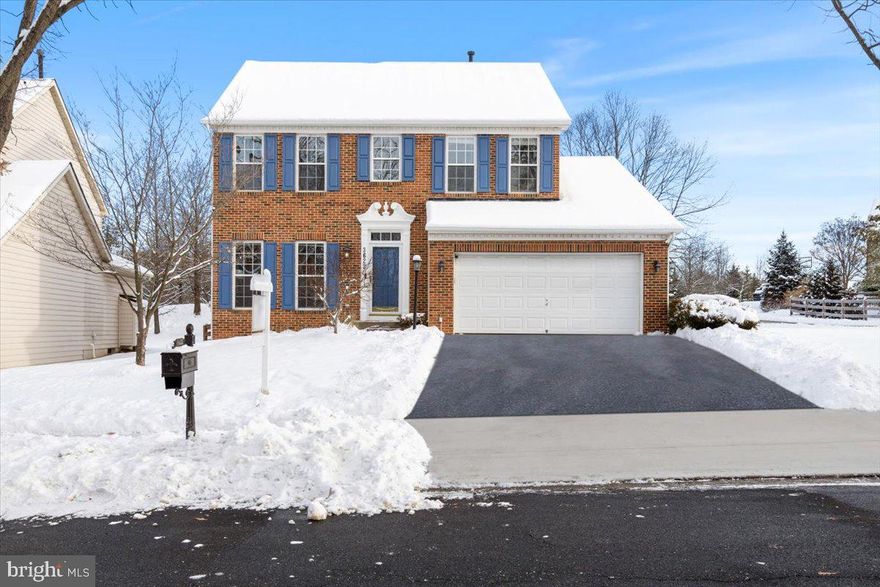 Interior photos will be uploaded by Monday. Delightful brick front colonial is perfectly situated on the highly desired, non through street of Denison Street in The Villages of Urbana.   Once inside, you will love the dramatic two story entry sharing space with a formal living and dining room. The heart of the home and otherwise known as command central, is a bright and sunny kitchen that opens to a wall of windows in the breakfast room and family room. Entertain with ease and privacy on the paver patio surrounded by a fully fenced yard backing to an open view of trees and nature.  Upstairs retreat to the owner's suite with a dramatic vaulted ceiling and en suite bath featuring a seperate shower, soaking tub and dual vanities. The three additional bedrooms are all large and share a hall bath. The basement rec room is the ultimate space for the second hang out area with another craft or gaming space down the hall. The fifth large bedroom and third full bathroom complete this space. Enjoy the neighborhood amenities all  within walking distance of Harris Street and Shaffers Mill pools, shopping, library and many restaurants. Easy commuting to 270 and I-70.
