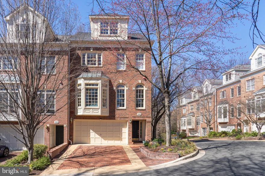 Presenting this exquisitely renovated corner townhome in Hillandale, boasting 3 Bedrooms, 4.5 Baths, and four levels of living space that have been extensively renovated (close to $600k in renovations). Inside, high ceilings, big windows, and modern finishes combine to create an exceptionally spacious ambiance, with a great indoor-outdoor flow. Enter through a spacious foyer, and ascend to the living room with 12' ceilings and dramatic arched windows that frame leafy views. Step out onto a large private deck with verdant views. The gourmet kitchen was completely renovated, and boasts Dacor panel-front appliances, custom cabinetry and a breakfast nook. The dining room is large and has 9' ceilings. Upstairs, the primary bedroom has large vaulted ceilings, a gas fireplace, and a Juliette balcony with panoramic views. large walk in closet and master bath with dual vanities, water cabinet, shower, and deep soaking tub. on this level is a hall bath with soaking tub, laundry, and a second walk-in closet (could be easily converted back into a bedroom). The third floor has a large bedroom and full bath. The downstairs is a custom-built media room with high ceilings, a full bath, and step out onto a gorgeous private patio with a outdoor kitchen  includes a 6-burner grill, two infrared burners, a rotisserie, a beverage center, a sink with both hot and cold water, a refrigerator, a plumbed gas line, a dishwasher, and ample storage space.  a large garage parking plus driveway.Nestled in the heart of Georgetown, Hillandale offers 24/7 security, lush landscaped grounds, a swimming pool, tennis courts, and more. A rare opportunity to own a refined residence in one of DC’s most coveted enclaves!