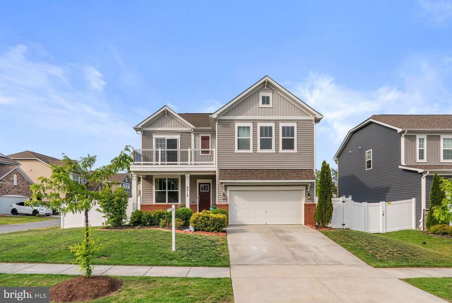 This is one of those homes that just feels right the second you walk in. This 6 bedroom Hadley model offers the space, flexibility, and upgrades today’s buyers are looking for, all just minutes from Historic Main Street and Maple Lawn dining.

The main level features a bedroom and full bath, ideal for guests, multigenerational living, or a private home office. A custom glass slider creates a dedicated office or flex space while maintaining the open feel. The kitchen opens seamlessly to the main living area and includes granite countertops, stainless steel appliances, subway tile backsplash, and in ceiling surround sound.

Upstairs, the spacious owner’s suite includes a private porch, spa like bath with soaking tub, glass walk in shower, dual vanities, and a large walk in closet. Additional bedrooms all include walk in closets, and the oversized loft provides flexible living space with built in speakers for a great entertainment space!

The fully finished walkout basement offers a large rec room, additional bedroom, full bath, and a kitchenette creating excellent in law suite potential.

Outdoor features include a fully fenced backyard with a 6 foot vinyl privacy fence, patio, front porch, and private owner’s suite porch. Additional highlights include brand new carpet, a 2 car garage, and a full security camera system. Built in 2019, this home offers modern construction with thoughtful upgrades throughout.

Call today for details or your private showing.