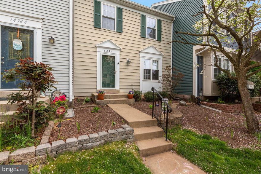 Beautifully updated by current owners.  Kitchen with granite, back splash, new cabinets and appliances.  Updated baths. Updated laminate flooring and carpeting throughout. Recessed lighting throughout. Deck backing to trees.  Walk out lower level to patio and fenced yard. Complete list of updates and repairs in documents section.