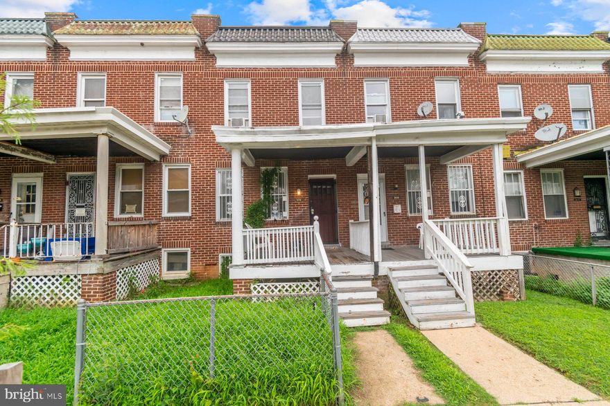 Newly refreshed 3BR/2BA classic style Townhome located on a quiet street.  Make your way to the covered front porch of your home and open the door into a home filled with original character, very nice flooring, and a freshly painted interior.  The main floor offers a good amount of space, a full bath with a walk-in shower, a kitchen and laundry.  The second floor boasts 3 nicely sized bedrooms and a full bath.  The lower level is semi-finished offering a finished large room, laundry, storage, and a walk-out to the fenced yard. From the main floor step outside to a yard offering tons of green space and so many possibilities.  This home is move-in ready with so much to offer new homeowners and is located in close proximity to shopping, restaurants, and commuter routes.