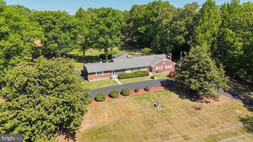 This property presents a rare development opportunity in the heart of Waldorf. Situated on approximately 4.12 acres and zoned RM (Residential Medium Density), this property offers exceptional potential for builders, developers, and investors seeking a prime location within one of Charles County’s fastest growing corridor
Ideally positioned just off the Route 301 corridor, the property is surrounded by established residential communities, retail, commuter routes, and ongoing commercial expansion. The site backs to active commercial development, further enhancing its long-term growth potential and strategic positioning within this rapidly evolving area. The property is improved with an existing occupied residence; however, the primary value is believed to be in the land and future development possibilities. Potential uses may include a townhome community, single-family subdivision, cluster-style residential development, or possible assemblage opportunities with neighboring parcels. Conceptual yield estimates may support approximately 24–36 townhomes or 6–10 single-family lots, subject to county approvals and engineering. Buyer to verify zoning, land use, subdivision potential, utility availability, and all property information with Charles County.