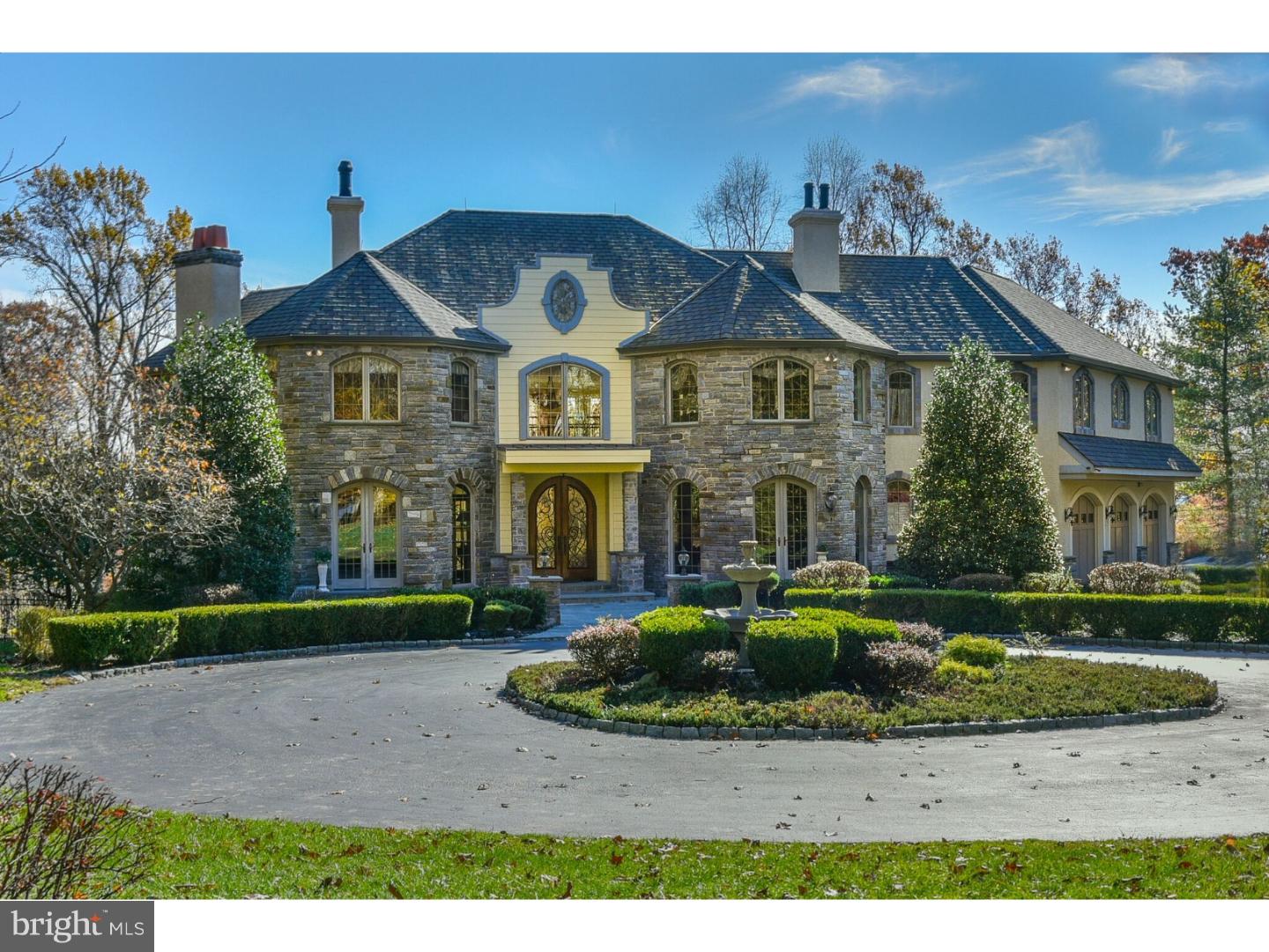 YOU'VE MADE IT - This elegant "Top of the Mountain" French Manor home in Tredyffrin Township, on a beautiful panoramic site in a secluded Valley Forge Mountain hill top location is nestled in nature - 6 acres with room to roam. There is NOTHING TO COMPARE to this homestead - truly for the discerning buyer. 'Extraordinaire': The rear secluded PARADISE features a free-form pool with Waterfall & Spa surrounded by EXTENSIVE hardscaping & now matured landscaping to this 6.3 Acre Mountaintop Retreat Estate ("Stay-Cation"). Many quality features coupled with sophisticated design create this unique One-of-a-Kind custom retreat that the finest of tastes will enjoy. Fairy tale like setting, with a circular driveway that leads you up to slated courtyard, with arched leaded glass doors in the light and airy open vestibule. Two story designer, gourmet French Country Kitchen with large "travertine" stone floors. Formal Living Room and elegant Dining Room (with Butler's Pantry) each with a fireplace, extensive molding and hardwood floors. Unrivaled owner's suite looking over the vast expanse of a home. Other bedrooms included in their own west wing. Significant expansive finished walk out basement. Improved Price, Improved Market, and Improved Condition since last on the market!