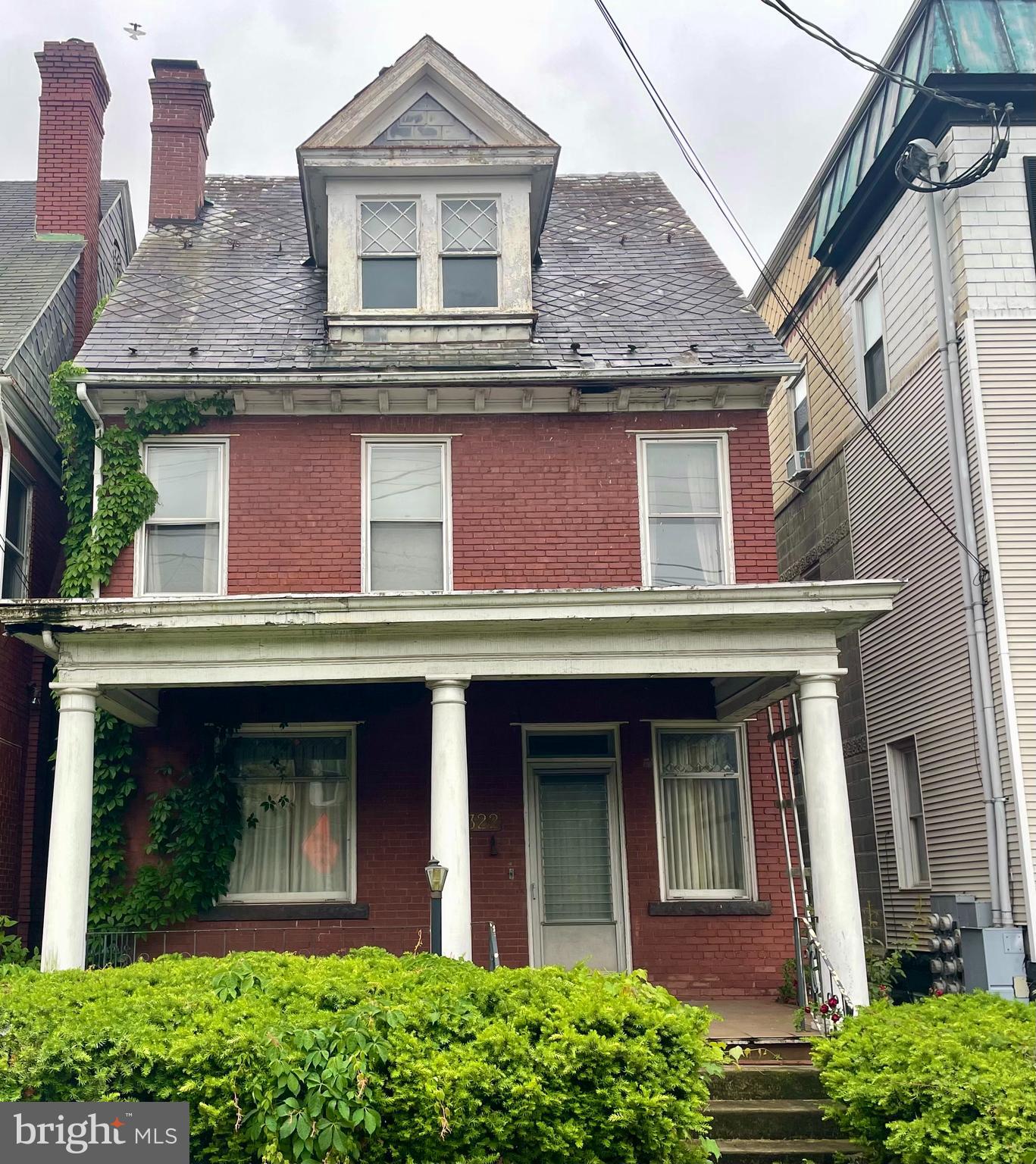 Investor Opportunity – Spacious Colonial with Tons of Potential! This large home in Cumberland features original woodwork, solid bones, and a flexible layout perfect for rental income or renovation resale. The main level includes a generous foyer, living room with fireplace, formal dining room, updated kitchen with pantry, and a convenient half bath plus main-level laundry.
The second floor offers three well-sized bedrooms, a full bath, and two walk-in closets. The third floor includes multiple unfinished rooms—ideal for creating additional living space, bedrooms, or a second rental unit. Enjoy a large front porch and classic curb appeal on a quiet street with easy access to local amenities.
Sold as-is—bring your vision and make it yours!