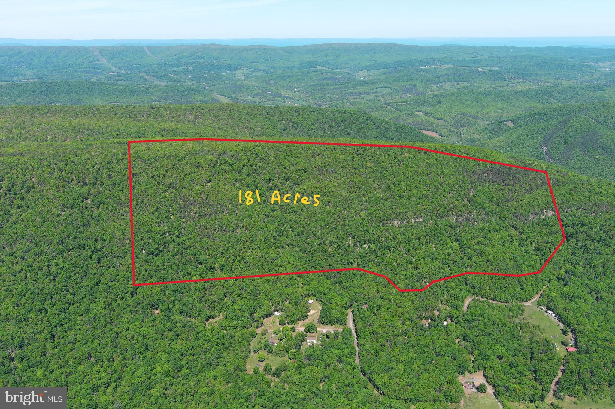 THE HUNT FOR THE ULTIMATE HUNTING PROPERTY IS OVER....181 UNRESTRICTED ACRES ON THE SOUTHERN SLOPE OF SHORT MOUNTAIN. YOUR EARS WILL POP BEFORE YOU GET TO THE TOP, 2500 FT ELEVATION AT THE TOP OF THE MOUNTAIN. BRAND NEW SURVEY! MILES OF ATV TRAILS, MASSIVE VIEWS, HUGE ROCK OUTCROPPINGS AND MARKETABLE TIMBER.....RUGGEDLY BEAUTIFUL! BEARS, BUCKS & BOBCATS GALORE. EASY ACCESS VIA DEAD END STATE MAINTAINED ROAD. GREAT CAMP/BUILD SITE WITH AWESOME VIEWS ONLY 400 FT OFF THE ROAD AND ONLY 400 FT AWAY FROM ELECTRICITY.....MINIMAL INFRASTRUCTURE COSTS TO BUILD THAN WHAT YOU'D TYPICALLY SEE ON A PROPERTY THIS SIZE. 181 ACRES NOT ENOUGH? AT THE TOP OF THE MOUNTAIN, THIS PROPERTY SHARES NEARLY A MILE BORDER WITH "HUNTERS RIDGE SPORTSMANS CLUB" 1506 ACRES OF PRIVATE LAND COVERED IN TRAILS. A SHARE IN HUNTERS RIDGE IS A 1/150 TH UNDIVIDED INTEREST. A SHARE IN HUNTERS RIDGE IS AVAILABLE AND CAN BE PURCHASED FOR AN ADDITIONAL $5000, GIVING YOU DIRECT ACCESS TO 1506 ADDITIONAL ACRES OF HUNTING & RIDING! WILD & WONDERFUL AT ITS BEST, ONLY 2 HOURS FROM NORTHERN VA/DC. TO CALL THIS PROPERTY A HUNTERS PARADISE WOULD BE A GROSS UNDERSTATEMENT......HUNT, SHOOT, ATV'S, CAMP OR BUILD.....NO RESTRICTIONS + NO HOA = NO PROBLEMS!