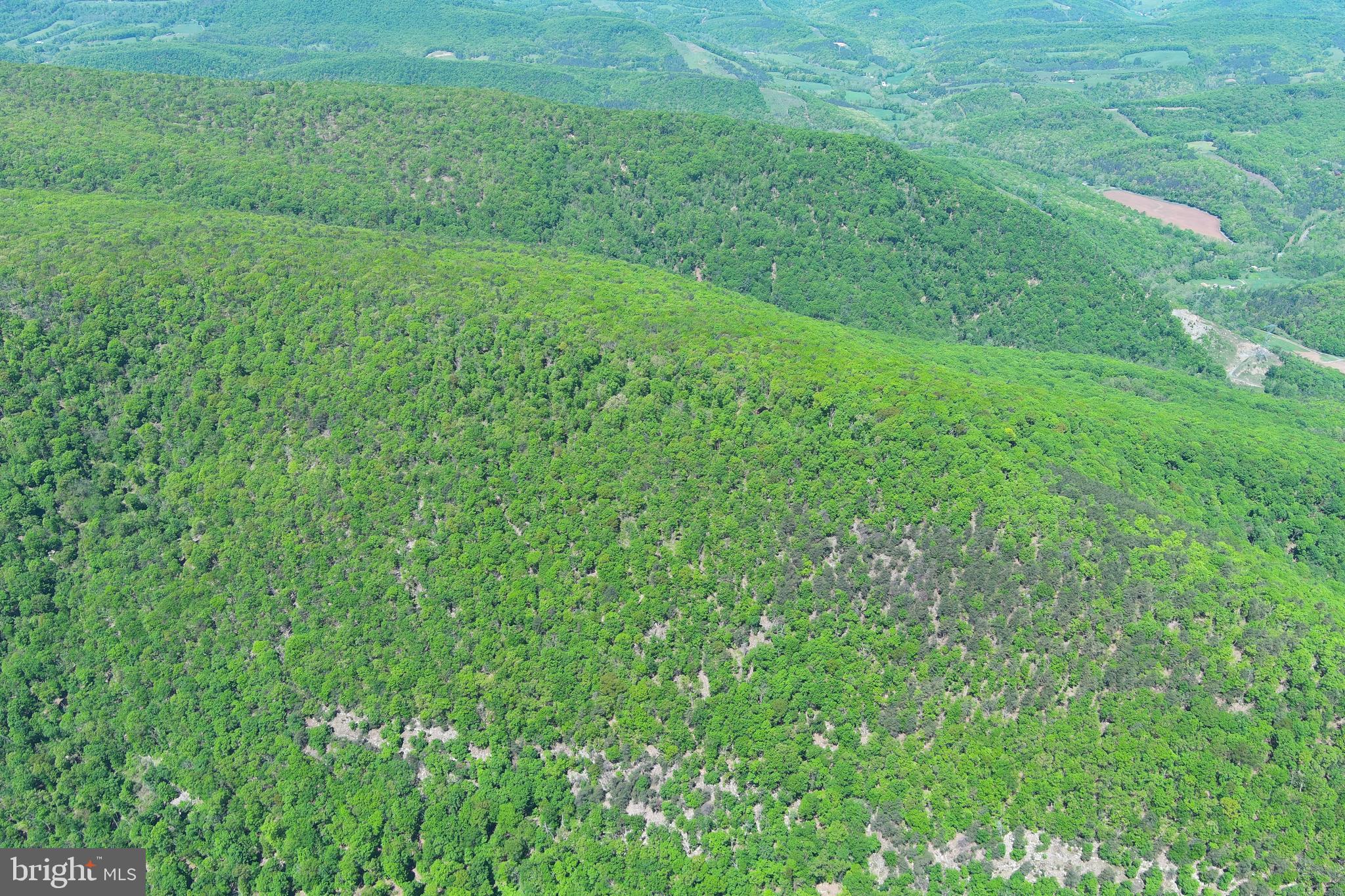 NONE UNRESTRICTED - Land