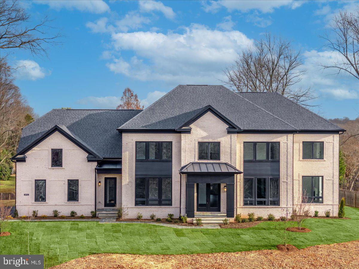 Move in ready! New Construction home Built by CarrHomes Custom Build - Located on a beautiful and quiet one-acre homesite in highly sought-after Oakton, VA. This magnificent contemporary home features a 3-car side entry garage, brick front and sides, and six bedrooms with 7.5 baths. The gourmet chef's kitchen has quartz countertops, Monogram professional appliances, and custom-quality cabinetry. A huge modern linear fireplace with a floor-to-ceiling porcelain surround highlights the expansive family room. The spacious, light-filled morning room located off the kitchen is the perfect spot to enjoy family dinners. The rest of the main level is made for entertaining with large rooms and 10 ft ceilings. The main level also includes a large guest room with a walk-in closet and private full bath. Working from home? It will be a treat in the light-filled study with views of the expansive backyard. Hardwood floors are on the main level, in the Owners Suite, and in the upper hallway. At the end of the day, you can unwind and relax in the oversized Owner's Suite with a generous sitting area, custom walk-in shower, two walk-in closets, and a stand-alone soaking tub. All the secondary bedrooms are very large and have large walk-in closets with private bathrooms and quartz countertops. The lower level includes a huge rec room, full bath, and Den. No upgrades were spared in this impressive, brand-new home.