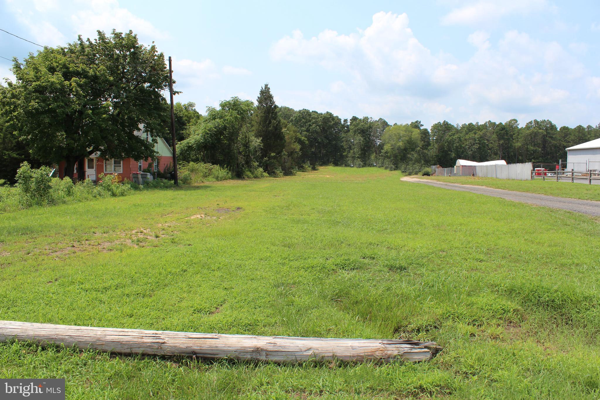 The 100x627 lot has city water 1" tap already in place. Come explore the options of opening your own business. Great Location! Please make an appointment before walking the property.