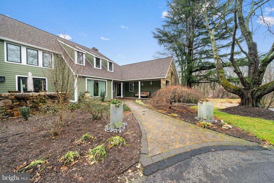 Elegance. Privacy. Comfort. Convenience. All four (and more) come together at 706 Haldane, an exclusive estate nestled on 5.8 pristine acres in the Unionville Chadds Ford School district in the private neighborhood of Haldane. This secluded oasis features a 4500+-square-foot house, ample outdoor space, beautiful tailored landscaping featuring meadows and a resort-style pool, sports court, and stunning views of the surrounding countryside for the best in Chester County living. The entrance welcomes you down a stately driveway with the feeling of a country manor. But the highlight of this property is its abundance of meticulously cared-for outdoor space and grounds that feature meadows, lush landscaping, a pond, patios, a newer exterior, roof, and windows. Inside you'll find a light, airy atmosphere with no shortage of upgrades designed to impress and make your daily life a breeze. Meanwhile, one-of-a-kind design elements like custom millwork, luxury hardwood flooring, and artfully crafted windows and moldings speak to a classic yet contemporary vibe. The chef-inspired kitchen features high-end appliances granite countertops and a of kind oversized eat-in island. The unique design and flow connect the kitchen, family room, and dining room, making this home perfect for entertaining. The living room welcomes you with warm wood accents, a wood-burning fireplace, and a sweeping bay window that brings in plenty of natural light throughout, as well as generous views of the pond and vegetation. This is a perfect place to curl up and read a book. In addition to a living area, tucked away you'll find a private first-floor primary bedroom with a private patio, exposed wood beams, and a custom oversized window that brings in an abundance of natural light that overlooks the pond. From the private patio, you can enjoy your morning coffee while checking emails or just taking in the views. The spa-like primary bathroom suite has been redesigned for comfort and relaxation with lots of natural light, a soaking tub, an oversized shower, and double sinks, and two walk-in custom closets!  The second floor features four roomy bedrooms and two full baths. The finished walk-out basement is the perfect place for a gym, game room, and or theater room. Ideally situated, this retreat is just minutes away from quaint town centers desirable shopping and dining destinations, and schools that are regularly ranked among the best in the Philadelphia area and the nation. Unionville School District is one of the top 10 public schools in the State of Pennsylvania. Large properties and estates go on the market every day. Rare jewels amid historic and untouched acreage do not. Come home to elegance, privacy, comfort, and convenience. Come home to 706 Haldane
