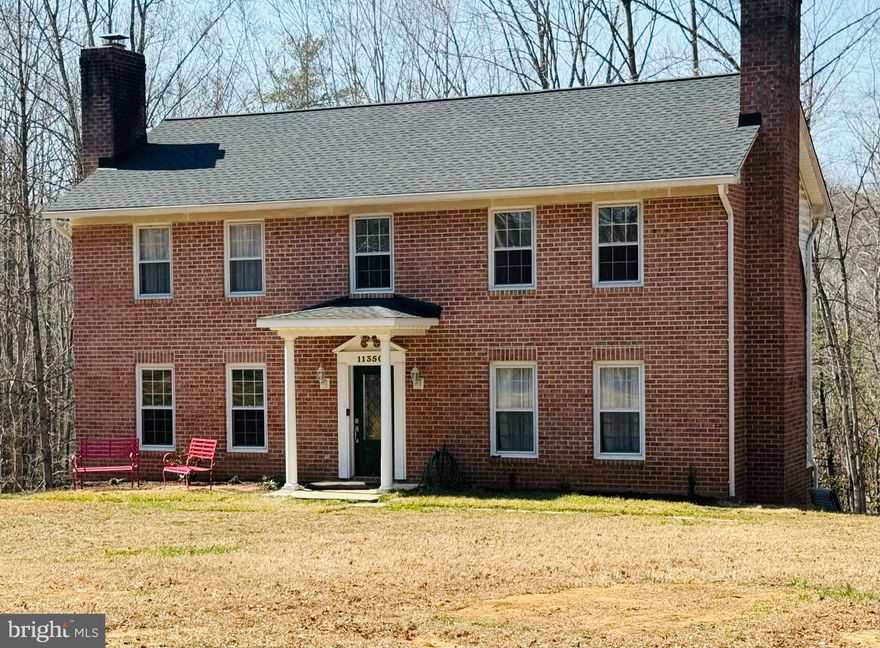 Fantastic Opportunity to make this all-brick traditional center hall colonial a home of your dreams with over 3200 square feet.    House sits on 5 acres in a secluded private neighborhood of 15 homes.  NO HOA.   Spacious Formal Living Room with wood burning fireplace that leads to a generous formal Dining Room with a view of the wooded rear of property. Kitchen includes a comfortable area for a table for family meals and conversation.  Additionally, the main level has a family room with another wood burning fireplace for casual gatherings of family and friends or quiet times.   Upper level has 5 light filled bedrooms.  Primary bedroom has an en suite full bath and with remaining 4 bedrooms sharing the full bath in the hall.  Lower basement level is unfinished, includes a third wood burning fireplace that will allow your creative thoughts to come to life.  Oakhurst Lane Owners have recently repaved by the entire road.   Roof  -2025, HVAC  - 2024 and Hot Water Heater - 2019.  Entire house is being sold "As Is". NO HOA