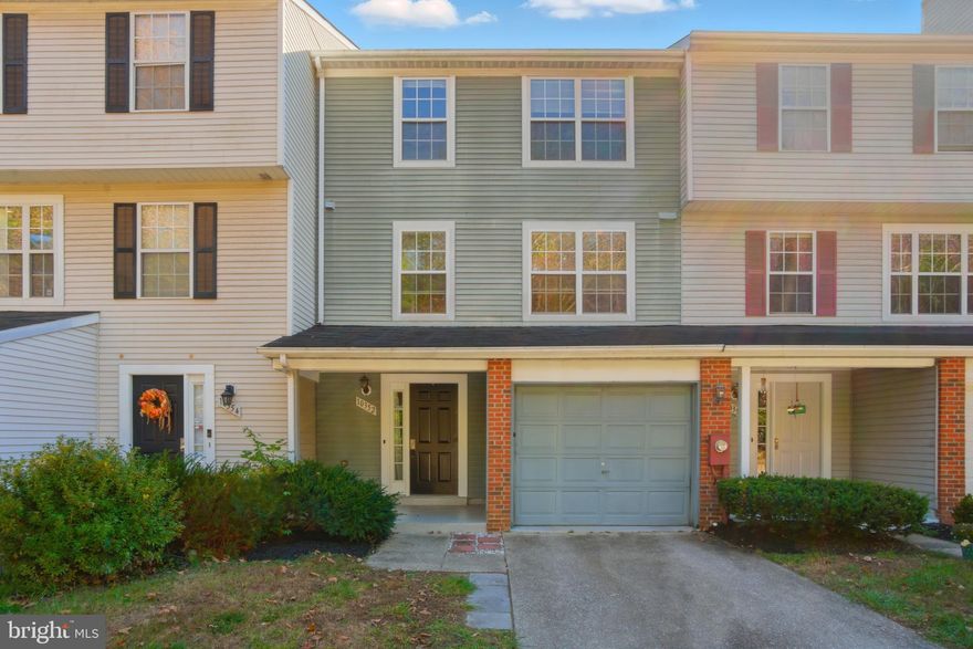 Spacious 3BR, 2FB/2HB garage townhome in a quiet Columbia neighborhood! Fresh paint, newer hard floors & new carpet, and beautifully remodeled baths. Sun-filled living room opens to a Trex deck overlooking open space. Updated kitchen with granite counters & stainless steel appliances. Primary suite with vaulted ceiling & private bath. Walk-out lower level family room with half bath. Fantastic location near Merriweather District, the Mall in Columbia, restaurants, parks, and all the vibrant amenities downtown Columbia has to offer!