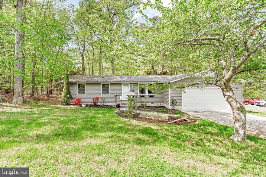 Welcome home to this quaint 3 Bedroom, 2 Full Bath little Gem that blends charm with upgrades.  Freshly painted and 7 new windows to be installed soon.  New flooring in hall and bedrooms, tile in dining/kitchen and wood floors in living room.  Washer/Dryer in garage with shelving for storage as well.  Shed in back yard.