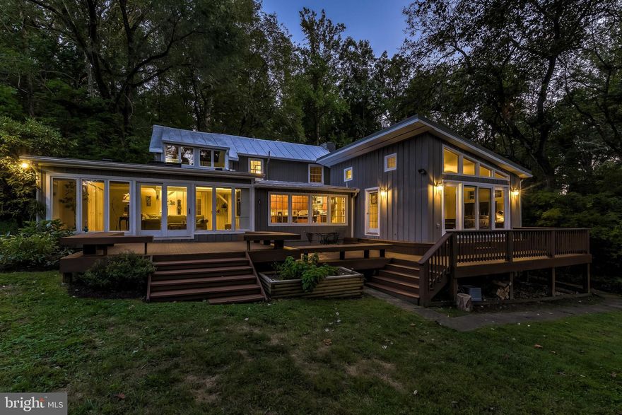 1840 s farmhouse renovated and expanded to merge old with new in the most wonderful way.  Original exposed beams and hardwoods seamlessly mix with vaulted ceilings, floor to ceiling windows and a first-floor master suite.  Double lot totaling 1.34 acres with meandering streams and idyllic grounds for flower, vegetable or pollinator gardens. Full width deck. Huge family room and first floor master with views of rolling horse fields.  Oversized eat in kitchen with custom built-ins.  Light and bright oasis on quiet street walking distance to The Hunt Cup yet just 5 mins to 83 and Wegmans.  Updated bathrooms, new paint on original farmhouse, new fiber reflective metal roof coating.  HVAC 2019, hot water heater and sump pump 2018.  Lovingly maintained and overflowing with charm.