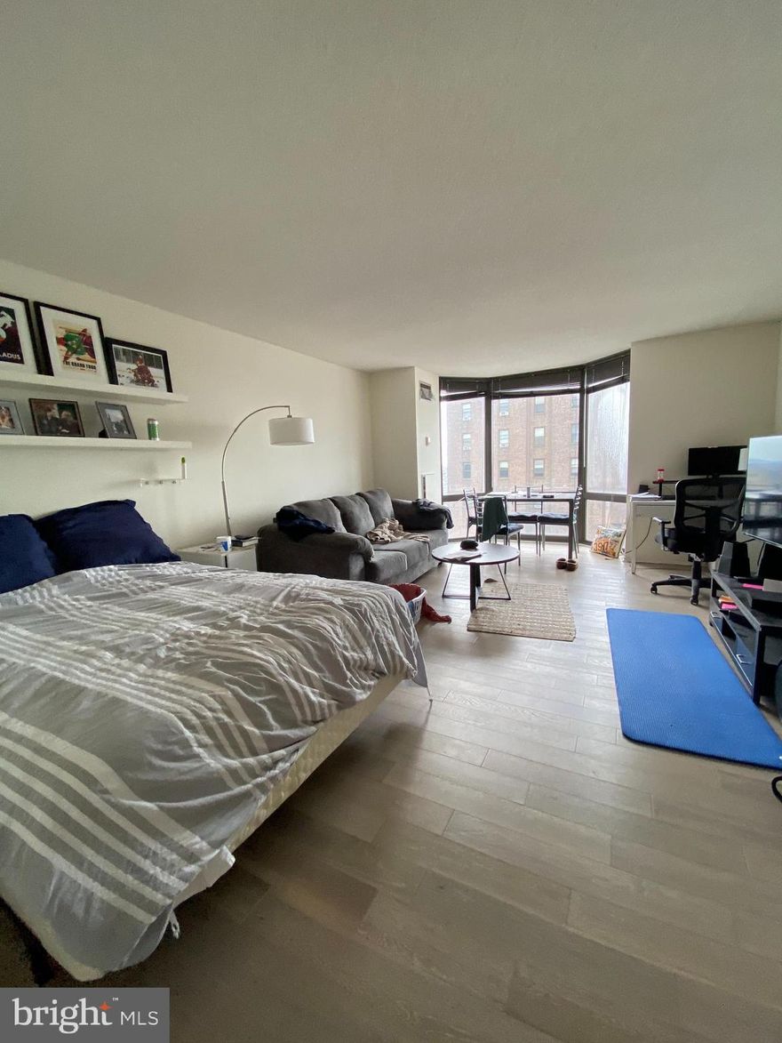Updated studio on high floor with vinyl floors steps away from Rittenhouse Square! This home has an open living space with floor-to-ceiling  bay window providing excellent natural light. There is a separate, upgraded kitchen with stainless steel appliances and granite countertops. The bathroom features a shower/tub combination and updated vanity with a granite countertop. There is excellent closet space throughout. The Wanamaker House is located one block from Rittenhouse Square and provides easy access to both Center City and University City; residents enjoy a 24-hour doorman, a seasonal rooftop pool, a fitness center, and a parking garage available for an additional fee (subject to availability). All common areas were recently renovated including the lobby, hallways, meeting room, amenity lounge, and fitness center, designed by world- renowned architect Cecil Baker.