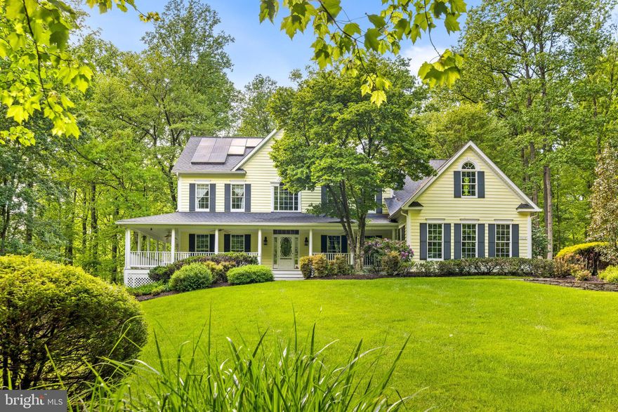 Discover unparalleled luxury and comfort in this immaculate custom-built colonial, set in a prestigious private community. This home offers 4 bedrooms, 4.5 baths, and is elegantly situated on a 5.65-acre wooded lot, providing a serene, park-like setting.

Step inside to be captivated by the grand two-story foyer with its elegant curved staircase and Brazilian Cherry hardwood floors. The gourmet kitchen, a chef’s dream, features granite countertops, a large center island, Viking professional appliances including a 36” gas oven, 30” wall oven, Sub-Zero refrigerator, built-in microwave, and warming drawer. Choose between the sunlit breakfast room or the formal dining area for your meals.

The luxurious master suite is a true retreat, with a tray ceiling, gas fireplace, dual walk-in closets, and a spa-like ensuite with a soaking tub, walk-in shower, and dual vanities. Enjoy additional comfort and coziness with custom built-ins in the study and family room, and unique fireplaces adding elegance throughout.

The expansive outdoor area includes a plantation-style wraparound porch, a covered porch enhancing the outdoor living space, and a large patio with a two-tiered waterfall and stream. The rear deck offers tons of space for outdoor entertaining. The deck has a hot tub for you to soak on in the privacy of your wooded backyard oasis. The irrigation system keeps the lush landscaping vibrant. 

The sprawling, finished walk-out basement is perfect for entertaining, featuring a wet bar and ample space, with extra storage under the porch accessible via a full-size door. The home includes a side-loading 3-car garage and an additional rear-loading garage, giving you a 4th car garage for storage of bikes, riding mowers, snow blowers, and other toys, providing ample storage for yard equipment with easy access. Enjoy the convenience of being within three miles of five grocery stores and numerous restaurants.

This stunning property underwent several updates: solar installation (2020), HVAC replacement (2020), laundry room update with new washer/dryer (2021), EV charger installation (2021), LVP flooring in the basement (2022), and a master bath renovation in 2024. A new roof (2019) and extra moldings enhance every room, highlighting the custom craftsmanship beyond that of any national builder.

This home beautifully balances grandeur with coziness, offering a unique living experience that is hard to come by. Don’t miss the opportunity to own this exceptional property!