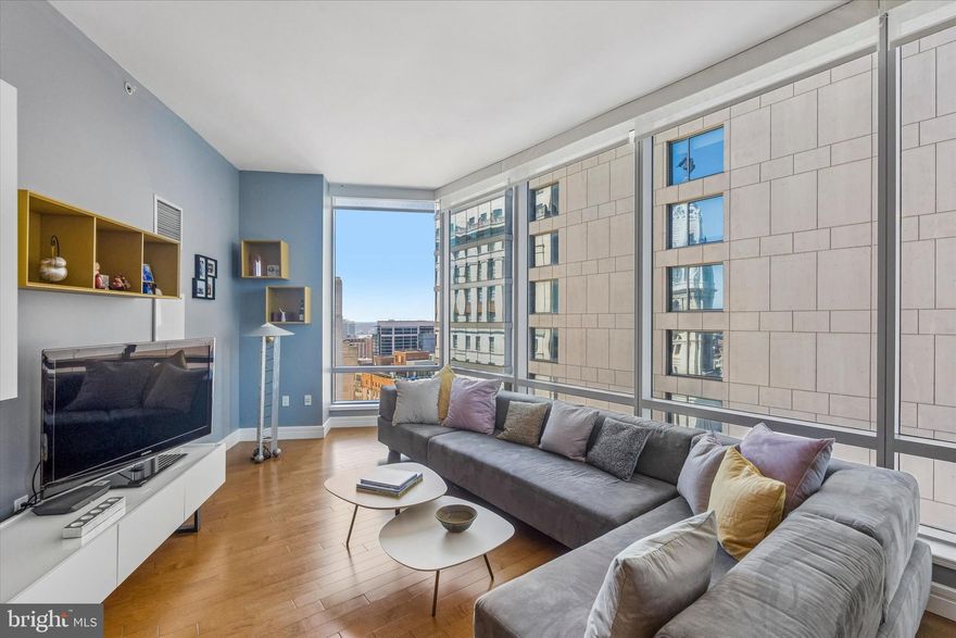 This thoughtfully, beautifully upgraded corner 2-bedroom 2 bath home on the 30th floor of The Ritz-Carlton Residences offers 10’ ceilings with floor-to-ceiling operable windows, flooding the home with natural light from both the east and west.  Wood floors throughout.  Automated shades, customized closets. Designer kitchen with Sefina Cumaru cabinetry, Viking gas cooking and convection microwave, Sub-Zero refrigerator, Miele dishwasher, Uline wine cooler, Dornbracht fixtures, stone countertops, Franke stainless steel under-mount sink, glass tile backsplash. The main bedroom has three customized closets and an ensuite luxurious bath with Calacatta marble floors, double vessel sinks, gorgeous Bain ultra-soaking tub, Duravit commode and a separate walk-in shower with frameless glass enclosure. The second bedroom is also perfect as a guest suite and/or office. Second bath features Crema Marfil marble floors and walk-in glass shower.  
Resident-only services and amenities include 24-hour concierge, 24-hour valet parking, porters, doorman, chauffeur service, 7000 sf state-of-the art fitness center overlooking City Hall and Dilworth Park, 54’ indoor lap pool, hot tub, locker rooms with shower and towels for the pool, yoga room, luxurious resident lounge to enjoy daily and/or to reserve for your private meeting or event, a theater/media room, outdoor terrace with gas grills, fire pits, sitting areas, water table, an on-site dog park, and a gated garden with a cascading waterfall.