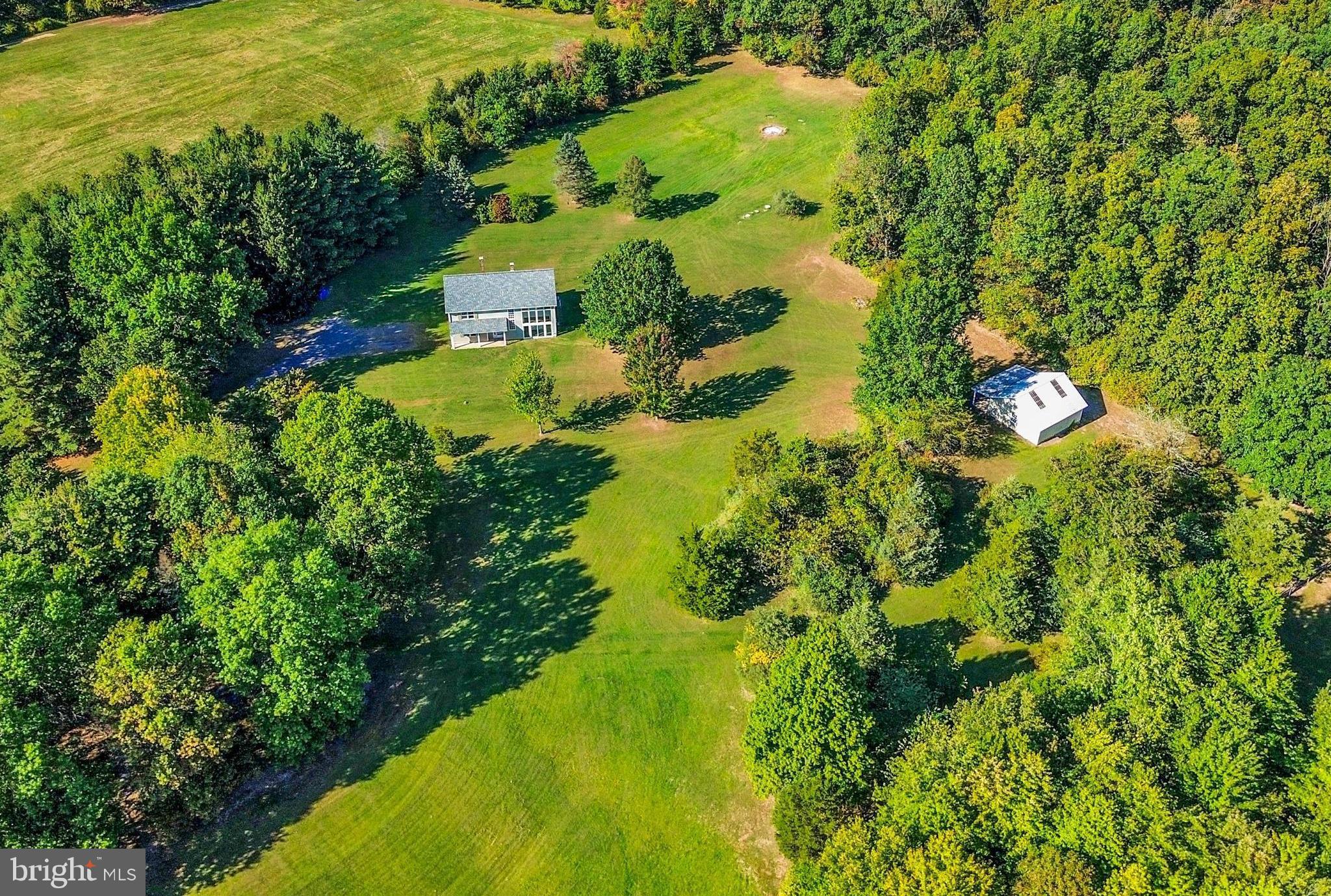 10.93 ACRES in Bedminster Township, with 3 bedrooms , and 2.5 baths! Ready to move in and start enjoying this spectacular property! Opened and wooded ,with stream in back, and completely secluded. As you drive down the long , winding driveway you will find a unique energy efficient country home, with 2 x 6 construction for maximum insulation . 2 YEAR NEWLY INSTALLED SAND MOUND septic system, approved for a 4 bedroom home. NEW ROOF with 30 year warranty. 32 x 24 barn with metal roof and sliding doors , electric water , AND WI-FI ,as well as 8 x 24 overhang extended roof . Great for horses, studio , workshop, etc. Home offers large family room with brick interior wall with wood fire place . French doors leading into either a den , dining room , office . Eat in kitchen with wood burning stove and 2 story solarium off of kitchen and door to side yard. This home offers a ton of natural light. Laundry room off of kitchen with separate powder room. Upstairs you will find 3 nice size bedrooms and master bedroom with full bath . Another Full bath in hallway , and a super large hall closet, for tons of storage. This home wont last . Price to sell quick.
Easy commute to 313, 113, 611 , shopping and restaurants just minutes away in Dublin. Only 10 minutes to Perkasie. 20 minutes to downtown Doylestown , and 15 minutes to Quakertown.
