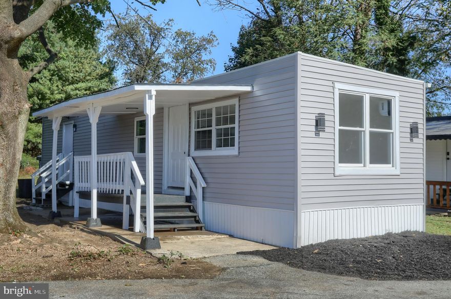 Completely Remodeled 2 Bedroom, 1 Bath Single-Wide! This beautifully updated home offers modern comfort with fresh paint, new flooring, updated kitchen with new cabinetry and countertops, and a fully renovated bathroom. Light and bright interior with an open-concept living area perfect for relaxing or entertaining. This home is move-in ready and ideal for first-time buyers, downsizers, or anyone looking for affordable, stylish living. Don't miss this turn-key opportunity!