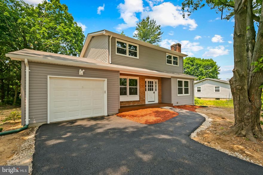Beautifully renovated from top-to-bottom this lovely 4 bedroom and 3 and a half bath Colonial in the very desirable Westminster MD. Featuring new kitchen with SS appliances and granite counter tops. New bath with masterful tile work. Recess lighting throughout, new windows, new AC/Furnace units, New driveway, New roof ,New siding, New fence,  New well equipment and a lot more!!! Three oversized bedrooms and 2 full bathrooms upstairs. Fully finished basement with a full bath and a room that can either be used as a bedroom or an office. New washer and dryer and an access to outside to a huge back yard and a very nice size new deck which is perfect for entertaining.  Must See!!!