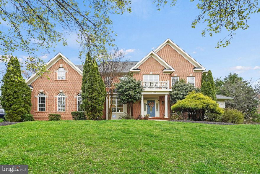 Exquisite brick home providing a luxurious living experience with extensive upgrades throughout. Spanning over 6,500 square feet, this property features 5 bedrooms and 4.5 bathrooms, ensuring ample space for comfortable living and entertaining. Expansive open floor plan, adorned with Anderson Tuftex engineered hardwood floors that stretch throughout the home. Beautifully updated chef's kitchen, with oversized island and quartz countertops. Tons of kitchen cabinet space with a large pantry. Updated stainless steel appliances, including smart refrigerator. Family room boasts tall ceilings and an abundance of natural light. Two main level sunrooms offer serene spaces filled with natural light, ideal for quiet moments or enjoying the views. Main level office with beautiful backyard views. Oversized master bedroom with peaceful sitting area and walk in closets. Fully updated master “spa” bathroom with soaking tub and glass encased shower. Oversized secondary bedrooms all have access to a full bathroom. Fully updated Jack n Jill bathroom. Convenient upstairs laundry room. Carpet recently replaced in secondary bedrooms.  The fully improved basement is a standout feature, equipped with a workout room, movie theater, oversized bedroom, a full bathroom, and a kitchenette, providing an additional level of luxury and convenience for residents and guests alike. Expansive outdoor space, with a beautiful large flat lot! Large spacious deck with trex, walk out basement with brick patio which is perfect for entertaining guests. Presenting like a model home, this Oakton masterpiece combines functionality with elegance, making it a perfect sanctuary for those seeking a blend of luxury, comfort, and contemporary living.