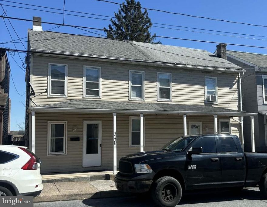 Great 2 unit investment property in Middletown Borough. Large 4 bedroom unit with a fenced in rear yard, and a 2 bedroom unit with yard and off street parking space. Both units feature front and rear porches, along with economical gas forced air heat, laundry hookups, and separate utilities.   Live in one side and rent the other, or add both to your portfolio. 4 bedroom is currently occupied with a long term tenant who pays all their own utilities. Conveniently located near Harrisburg airport, Amtrack station, bus stop, restaurants, grocery stores, parks and more. Some Photos are from last vacancy- similar conditions.