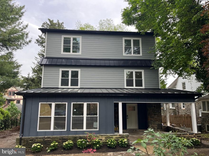 Nestled in a picturesque neighborhood, this stunning property at 160 Union Avenue stands as a testament to luxury and modern living. Every detail has been meticulously considered to ensure a seamless blend of comfort and elegance.
Upon arrival, the charm of this beautifully renovated home becomes immediately evident. The home has undergone a comprehensive renovation, stripped to the studs, and entirely refitted. The structure spans approximately 3,800 square feet and includes five bedrooms, four full bathrooms, and one powder room. 
The covered front porch establishes a welcoming atmosphere. Entering through the front door, you are greeted by a bright and modern interior featuring a spacious foyer equipped with a "mudroom-style" coat closet and powder room. The open layout concept is immediately captivating. Adjacent to the foyer is a versatile room suitable as a family room, den, playroom, or home office.
The dining room area boasts a wet bar with a sink and wine refrigerator, ideal for entertaining. The modern custom kitchen includes built-in GE Monogram™ 48” refrigerator, six-burner range top, 30” double oven, a 24” under-the-counter microwave drawer along with two stainless steel sinks, and dishwasher. The Dekton™ countertop, which is the latest and best countertop material on the market, is featured throughout the kitchen and wet bar. The oversized island with waterfall countertop seats five and offers additional storage.
Adjacent to the kitchen is a large composite wood deck with custom iron railing, providing ample space for hosting outdoor barbecues and relaxing in sunbeds overlooking the tree-filled yard. The deck features two sets of stairs, including one leading to the detached garage for convenient access.
The second floor has 4 bedrooms. Two bedrooms have en-suite bathrooms, while the other two share a hallway Bathroom that includes a tub and double sink. All bathrooms feature Custom Vanities and Porcelanosa™ tiles. Each bedroom is equipped with built-in closets.
A spacious laundry room on the second floor includes a high-efficiency washer and dryer, a sink, and storage cabinets. An oversized linen closet serves the entire floor.
The 3rd floor holds The primary bedroom, which is ultimately a complete self-sustaining luxury suite, offering a Large walk-in closet with built-in interior and a modern Kitchenette including a sink and a beverage fridge. The Primary bathroom is certainly a center piece of the property containing 2 custom Vanities, a beautiful soaking tub and a Grand double sided 7’ walk in shower with Porcelanosa™ tiles. The Large sunny bedroom has an oversized sliding door leading to a private outdoor balcony overlooking the tree-lined backyard. The balcony has a T.P.O roof with Paver Pedestal System Roof Deck. Attached to the bedroom is a small bonus room for either an additional closet, glam room or extra storage. 
The finished basement has a spacious open flex area suitable for various uses, such as a game room, gym, or office. There are two additional areas that can be closed off into separate rooms or used for extra storage.
All exterior siding has been replaced with James Hardie™ cement siding. The property has a new roof with black aluminum gutters and downspouts, along with a modern metal standing seam roof. The new windows are low E argon gas-filled double-hung. All interior walls and insulation are new. White oak hardwood flooring is installed throughout most of the property. New electric wiring, new electric service (200A) and plumbing are installed throughout. A high-efficiency tankless gas water heater provides continuous hot water. The finished basement features a new French drain with a sump pump.