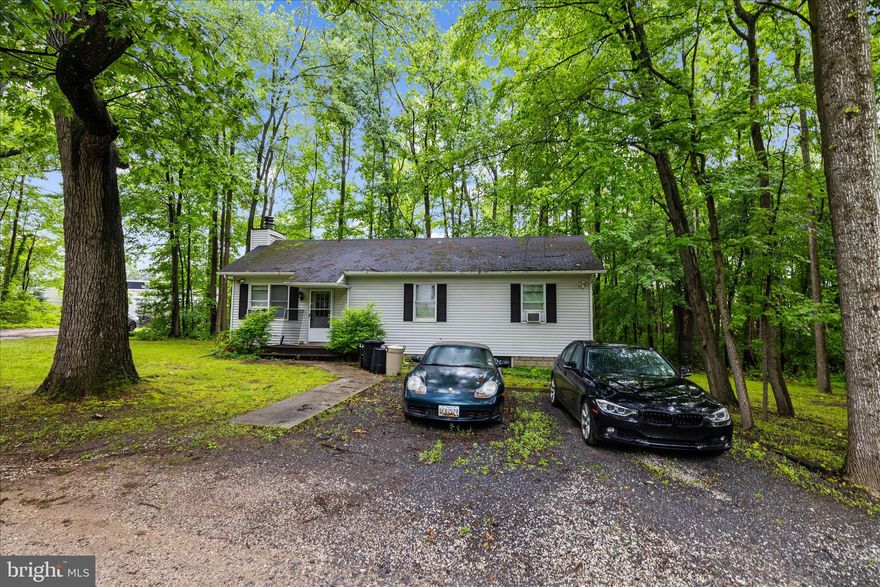 Highly sought-after Mixed-Use Property included in Odenton Town Center Master Plan Section 2.   Currently used as a family compound with garage with 1/2 bath. Directly in back of Odenton Self Storage with shared driveway easement.  SEE DRONE VIDEO FOR THIS PRISTINE PROPERTY !